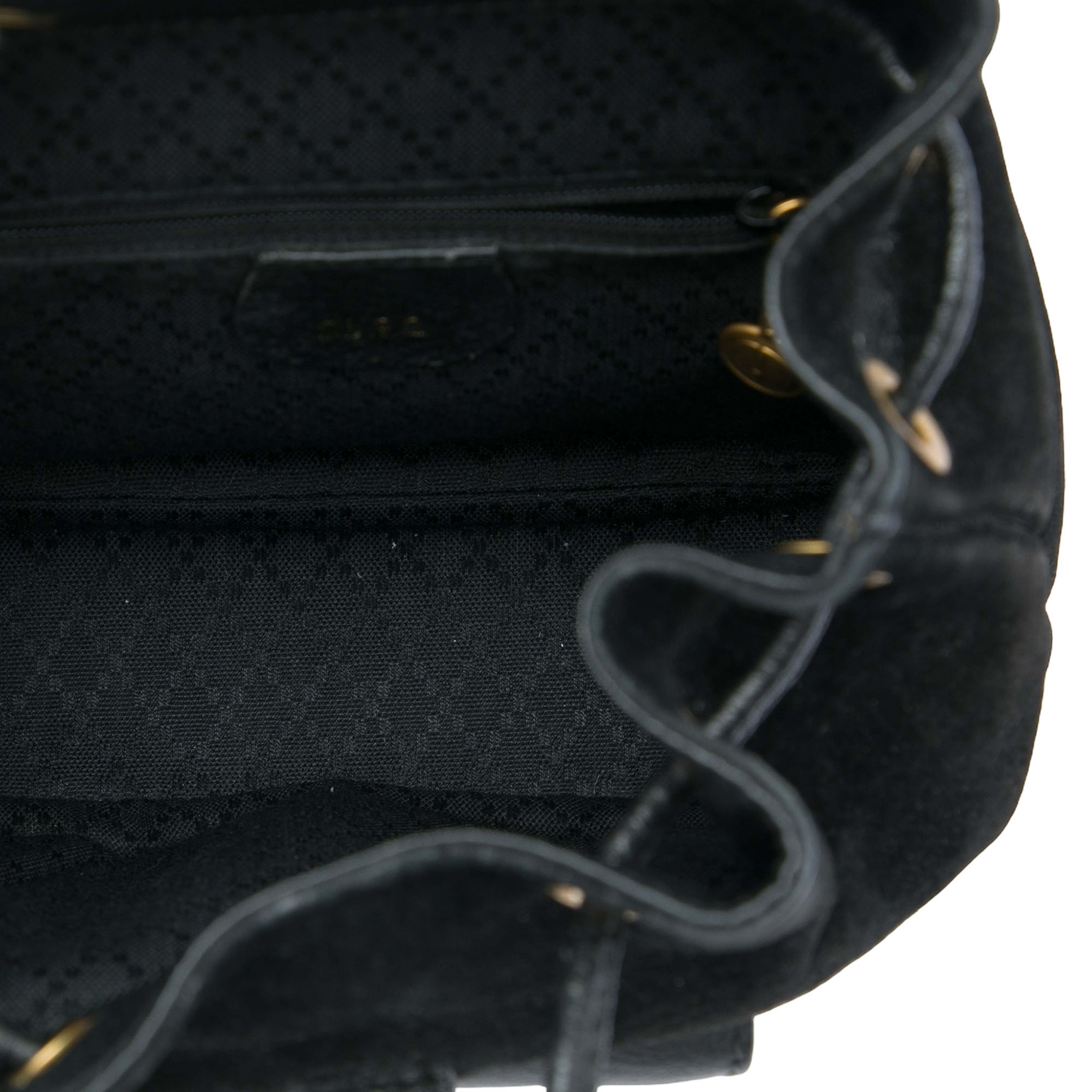 Gucci Suede Bamboo Drawstring Backpack, från Luxclusif, i färgen svart. Klicka för att öppna bilden i stort format