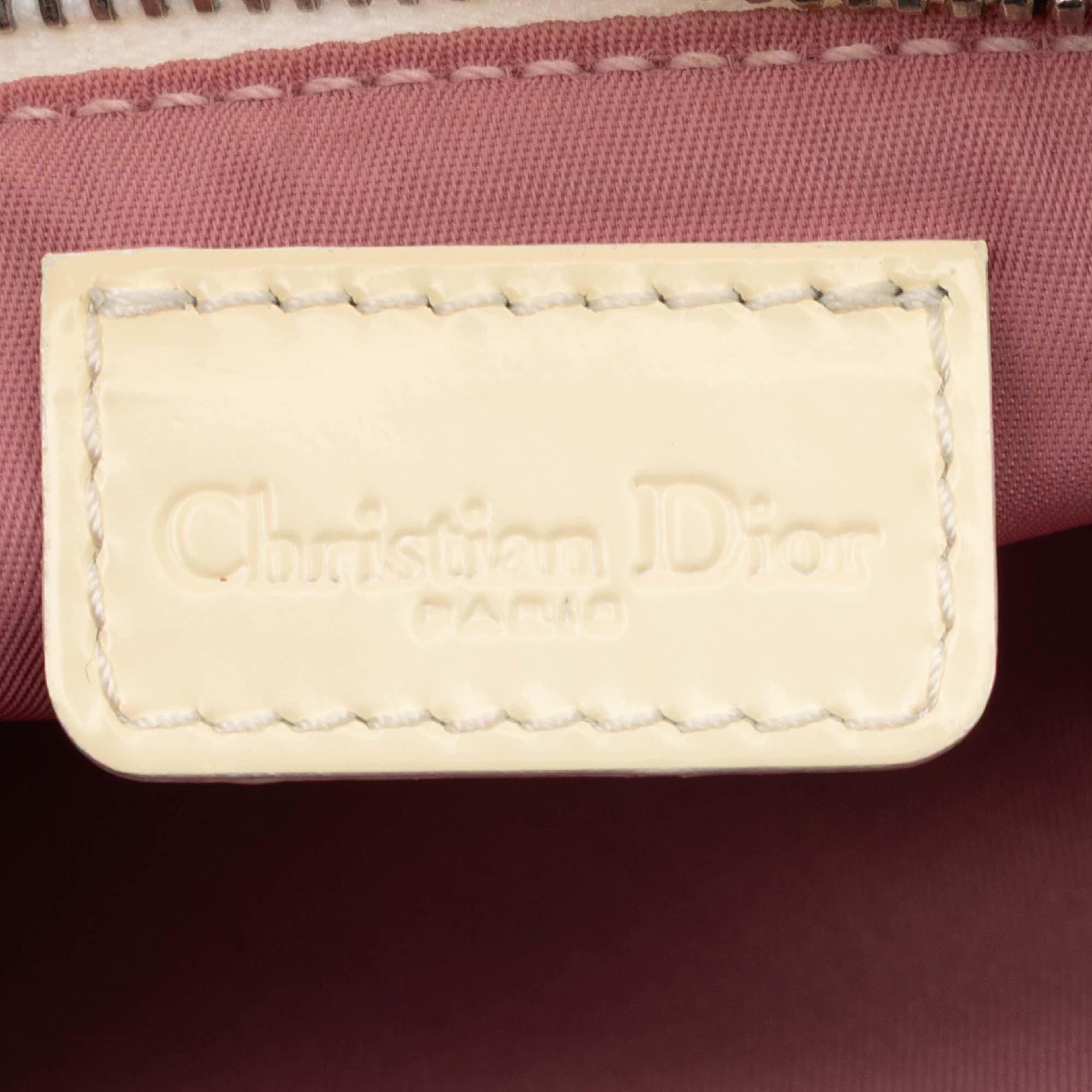 Dior Mini Diorissimo Coated Canvas Saddle Pochette, från Luxclusif, i färgen pink. Klicka för att öppna bilden i stort format