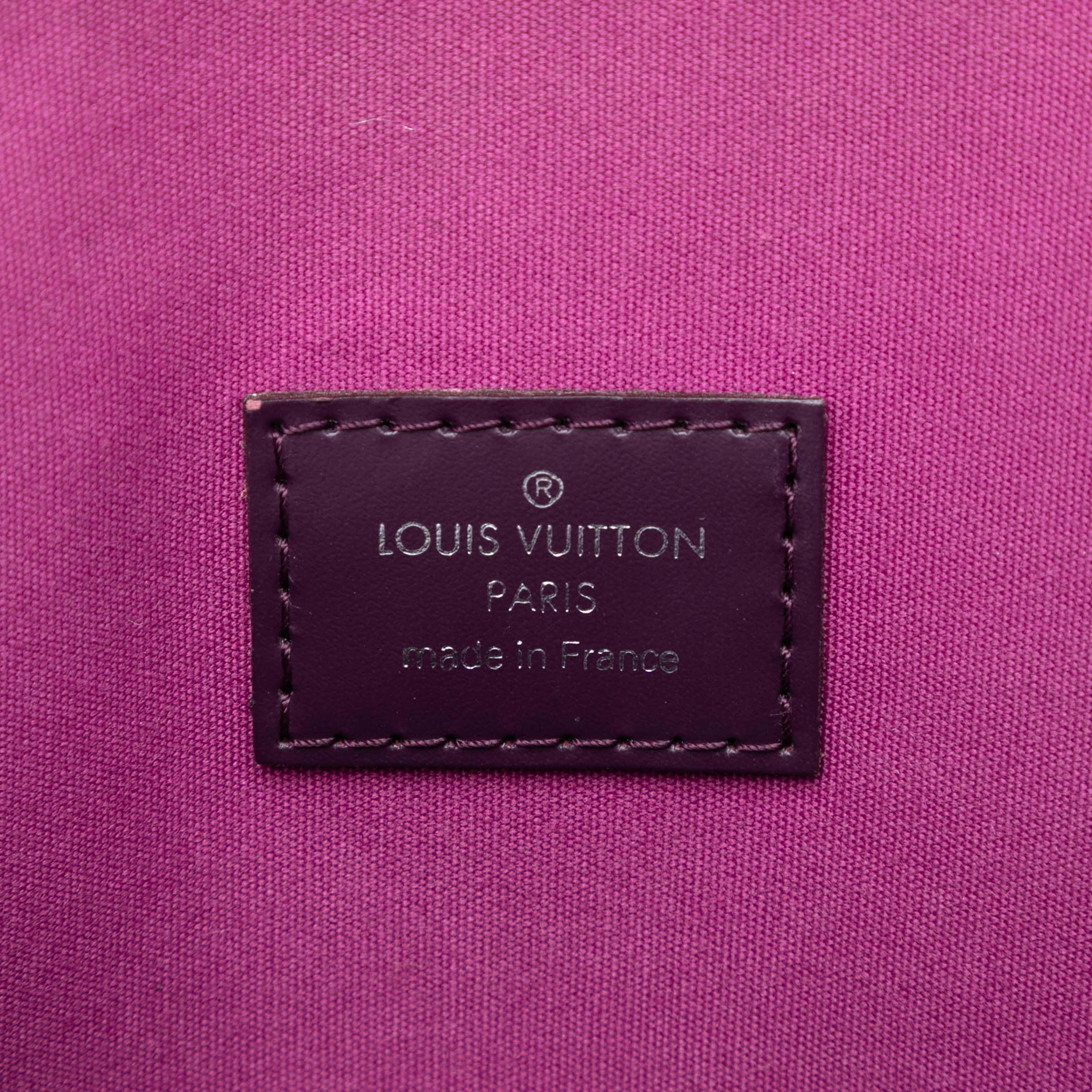 Louis Vuitton Epi Lockit Vertical, från Luxclusif, i färgen purple. Klicka för att öppna bilden i stort format