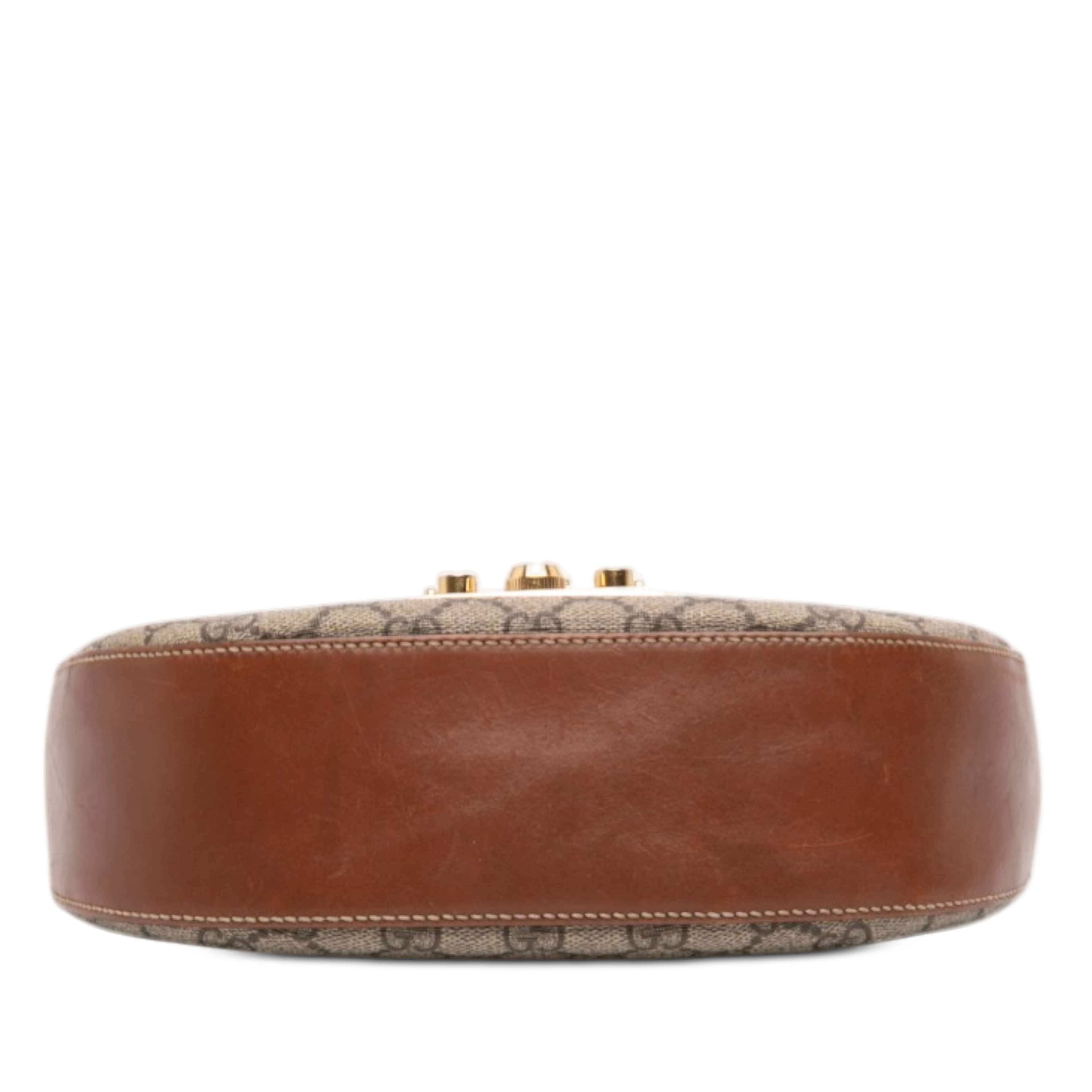 Gucci Gg Supreme Web Padlock Crossbody, från Luxclusif, i färgen beige. Klicka för att öppna bilden i stort format