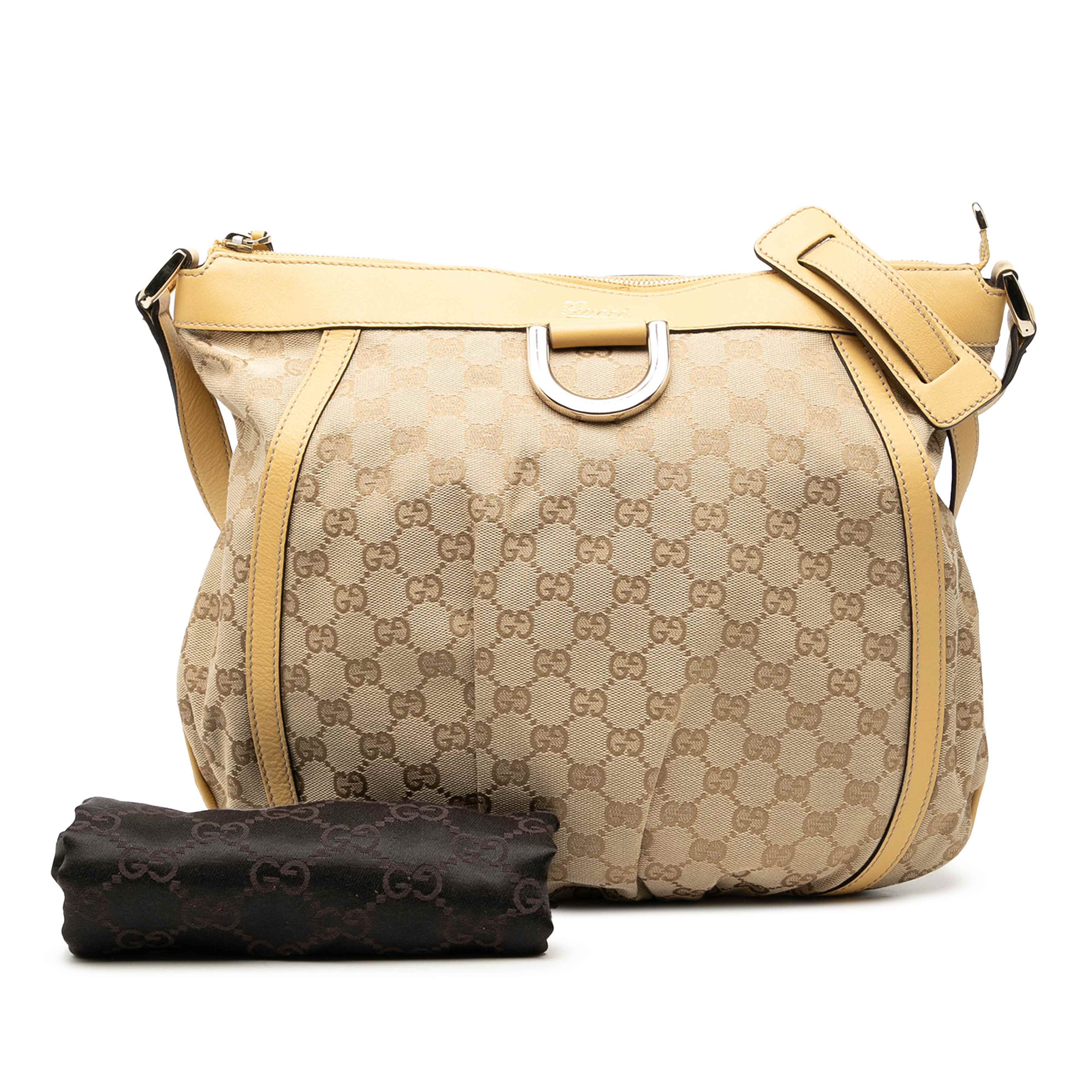 Gucci Gg Canvas Abbey D Ring Crossbody, från Luxclusif, i färgen gul. Klicka för att öppna bilden i stort format