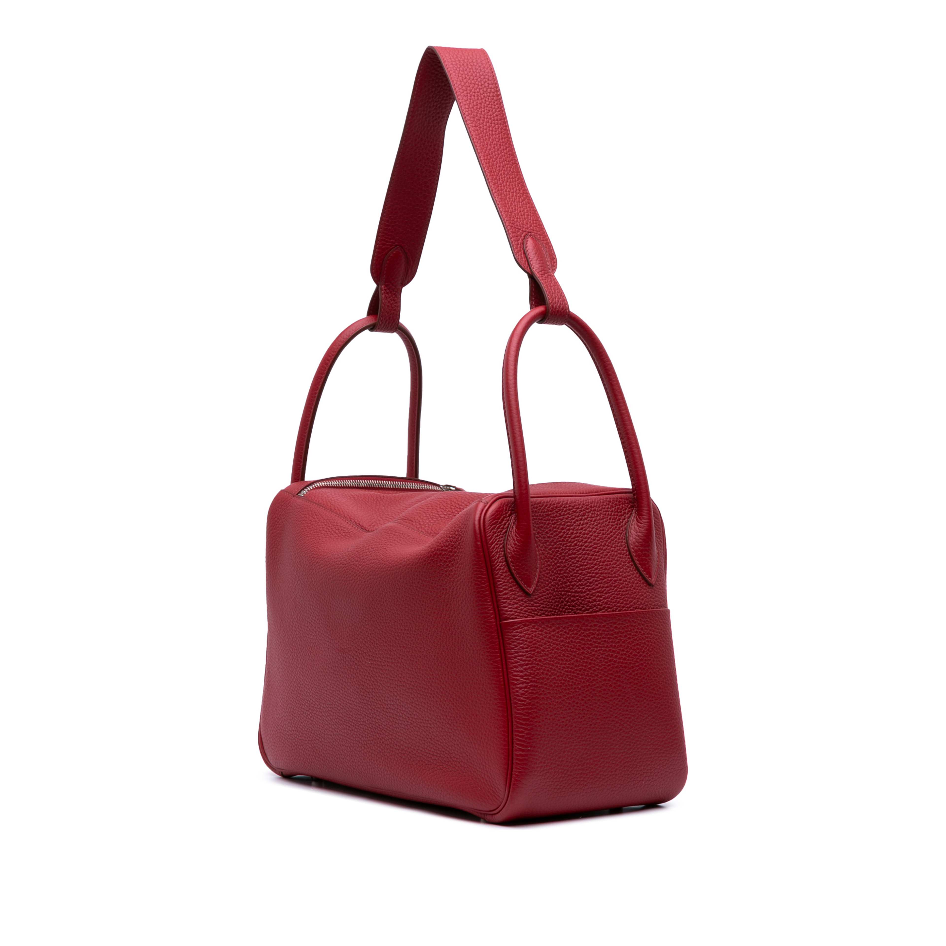 Hermès Clemence Lindy 34, från Luxclusif, i färgen dark red.