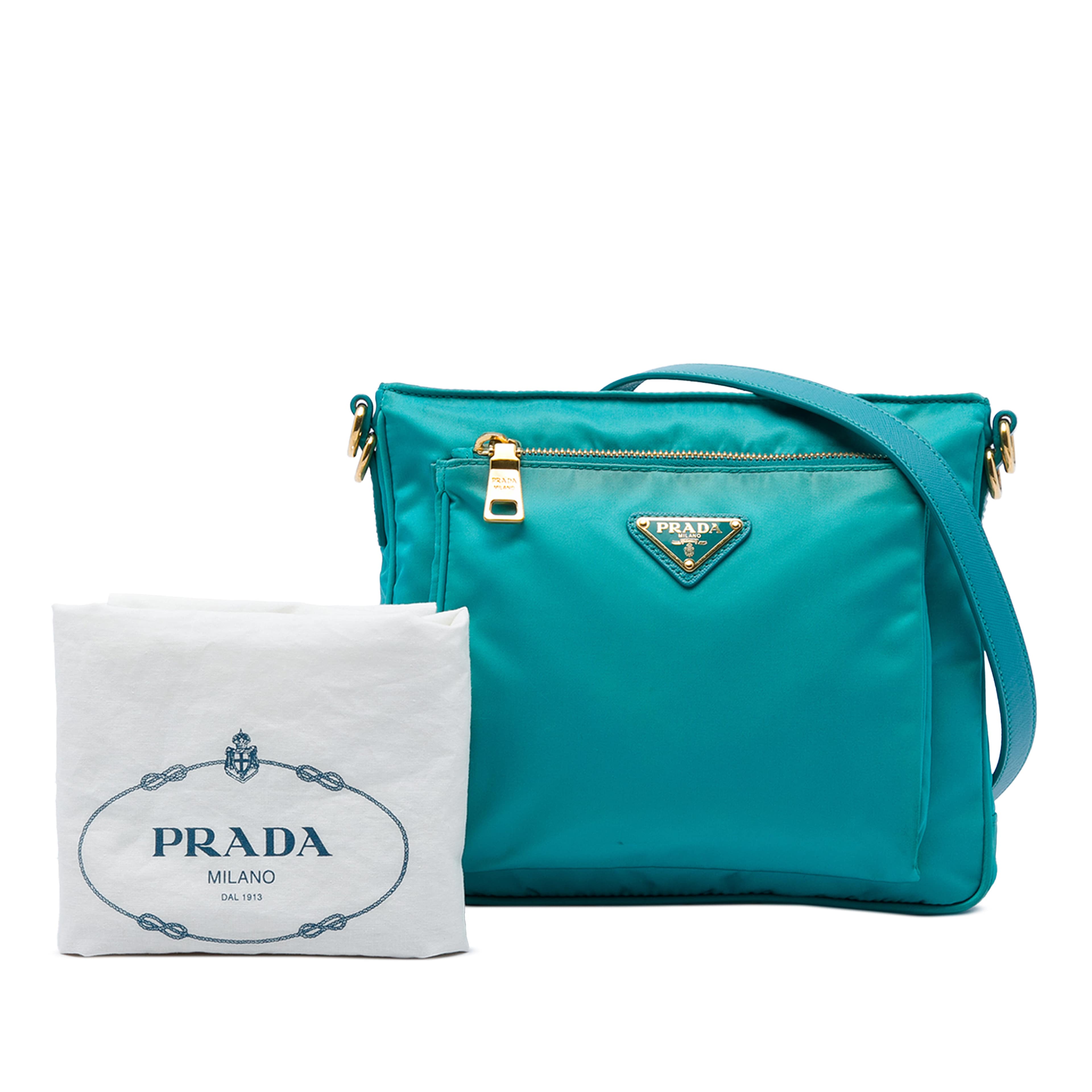 Prada Saffiano Trimmed Tessuto Zip Top Crossbody, från Luxclusif, i färgen blå. Klicka för att öppna bilden i stort format