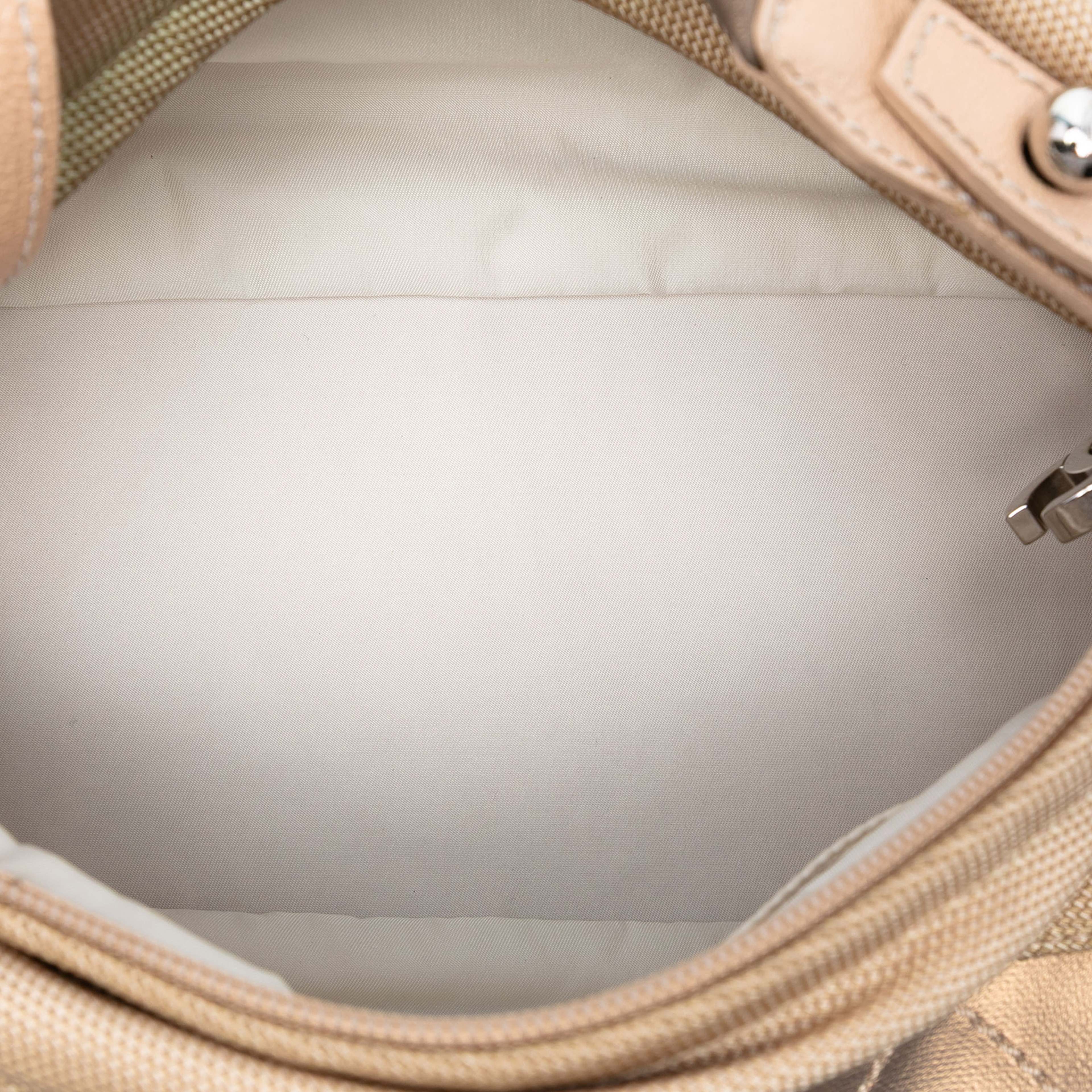 Chanel Paris Biarritz Quilted Coated Canvas Handbag, från Luxclusif, i färgen gold. Klicka för att öppna bilden i stort format