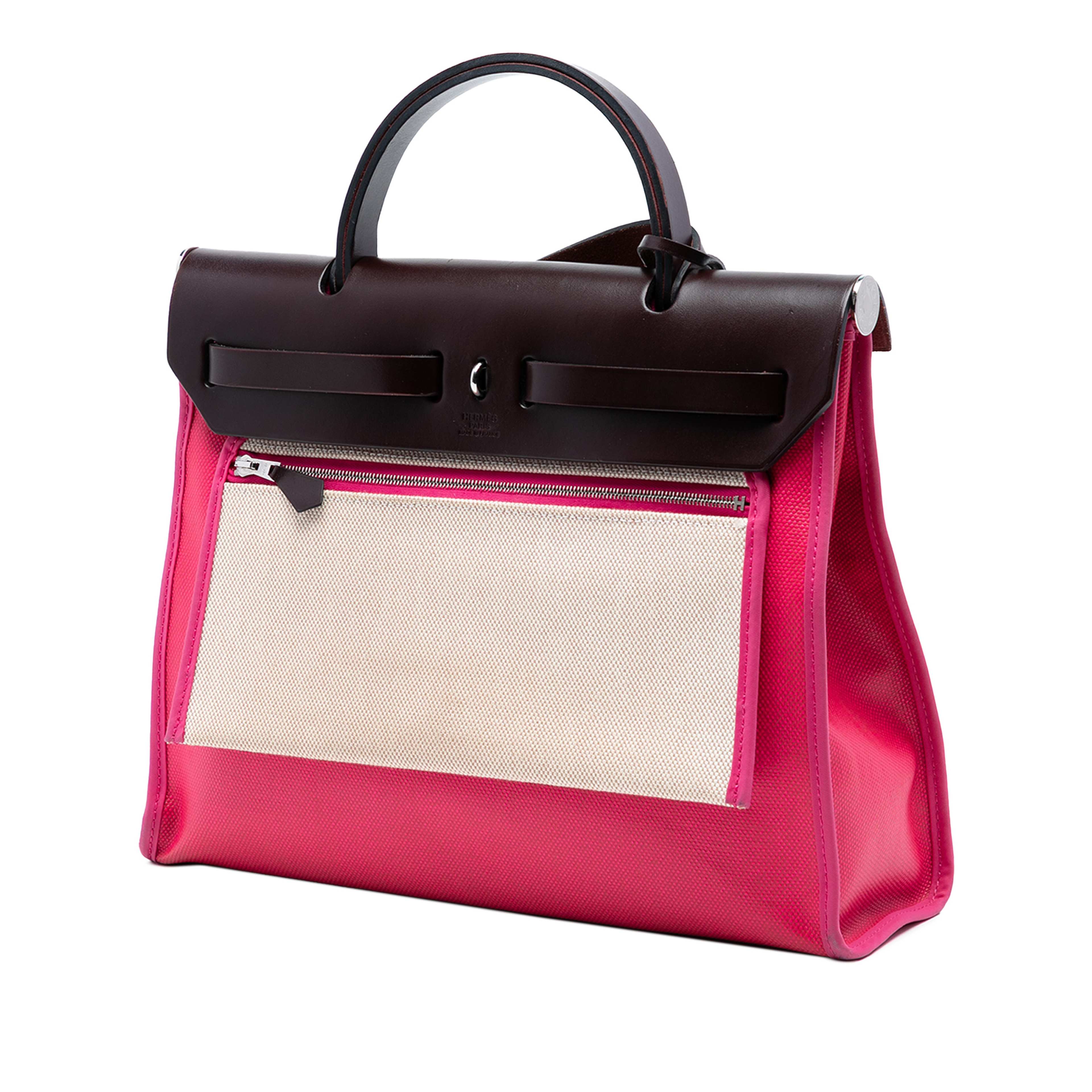 Hermès Toile H Berline Herbag Zip 31, från Luxclusif, i färgen dark pink. Klicka för att öppna bilden i stort format