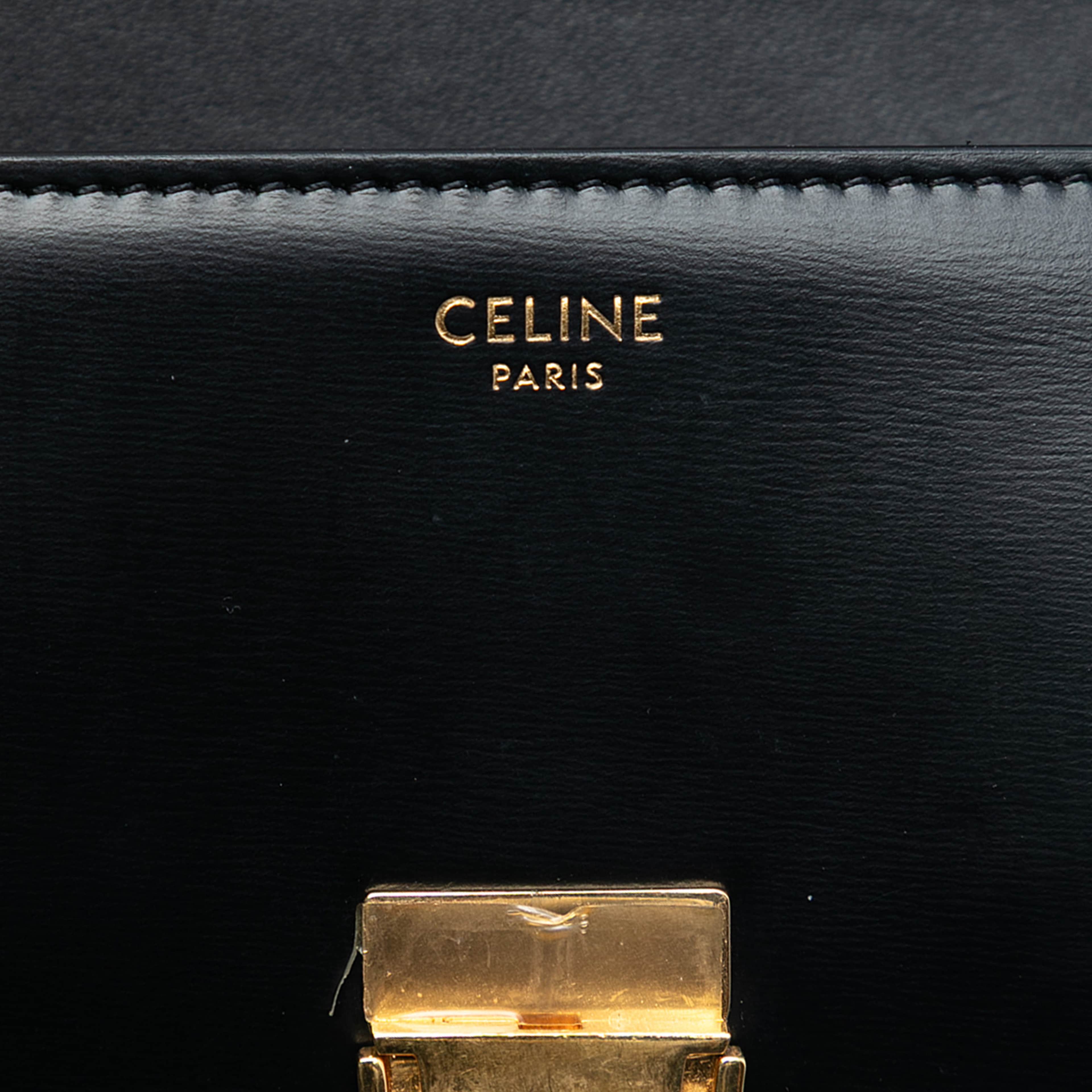 Celine Shiny Calfskin Triomphe Claude Shoulder Bag, från Luxclusif, i färgen black. Klicka för att öppna bilden i stort format
