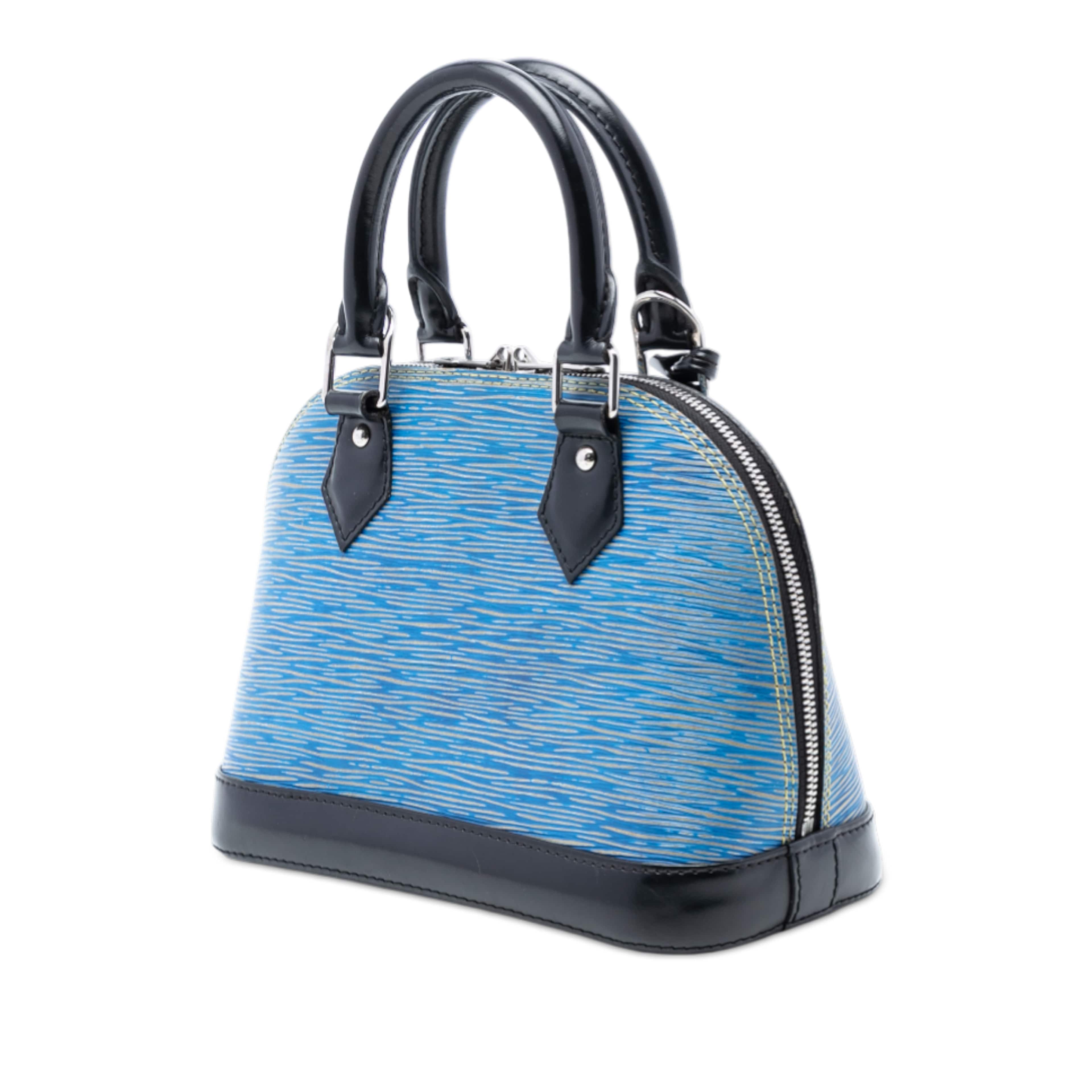 Louis Vuitton Epi Denim Alma Bb, från Luxclusif, i färgen blue. Klicka för att öppna bilden i stort format