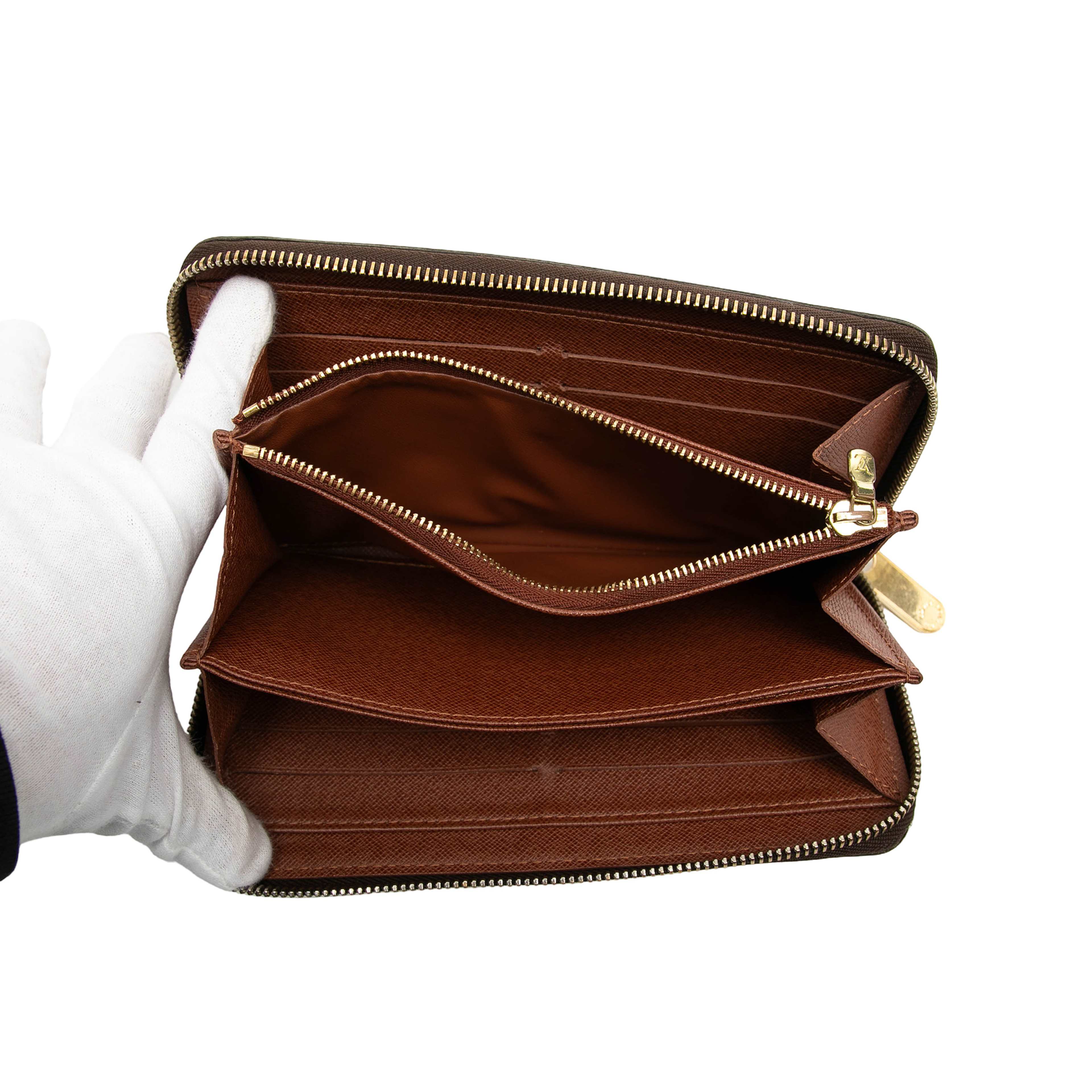 Louis Vuitton Monogram Zippy Long Wallet, från Luxclusif, i färgen brown. Klicka för att öppna bilden i stort format