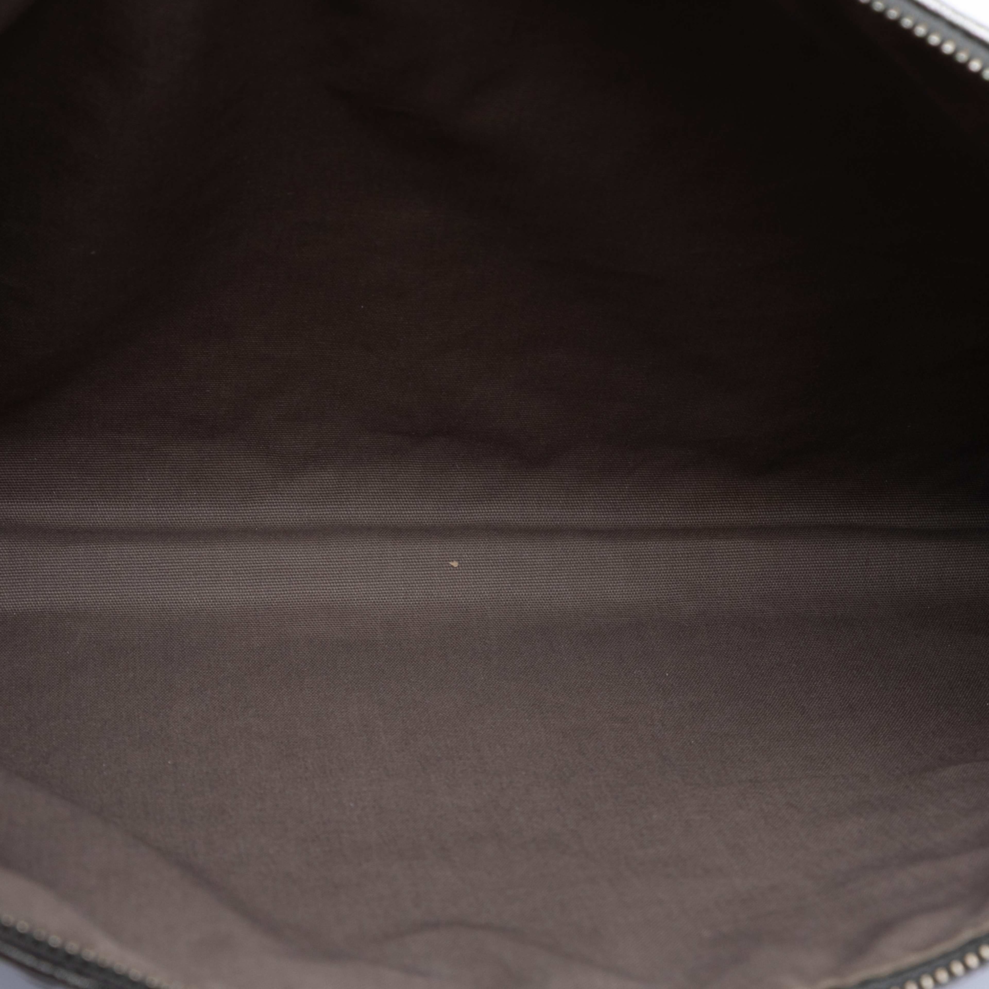 Bottega Veneta Metallic Nappa Intrecciato Clutch, från Luxclusif, i färgen dark gray. Klicka för att öppna bilden i stort format