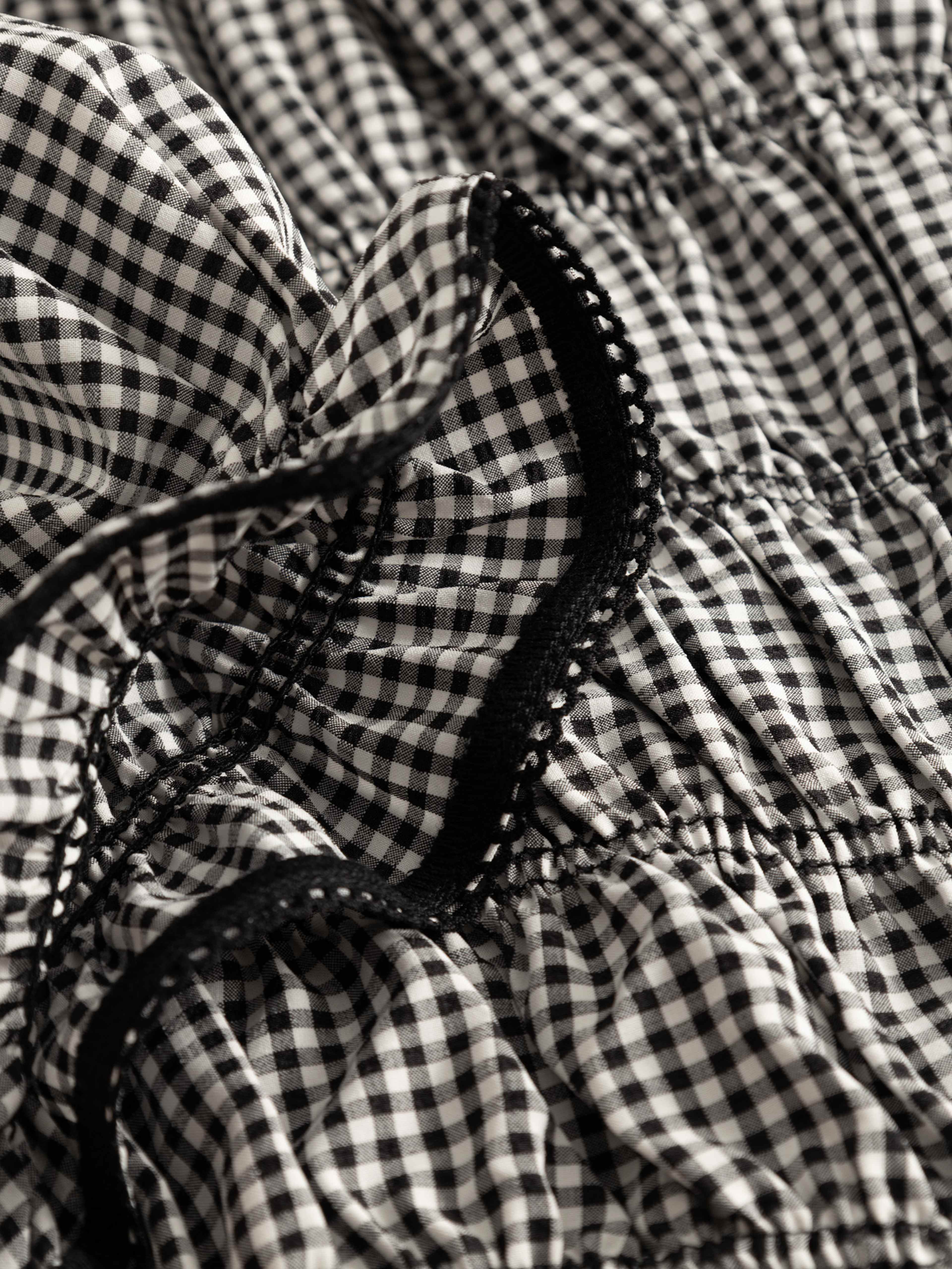 N-marty Blouse - Darlyn Black Check, från Noella, i färgen darlyn black check. Klicka för att öppna bilden i stort format