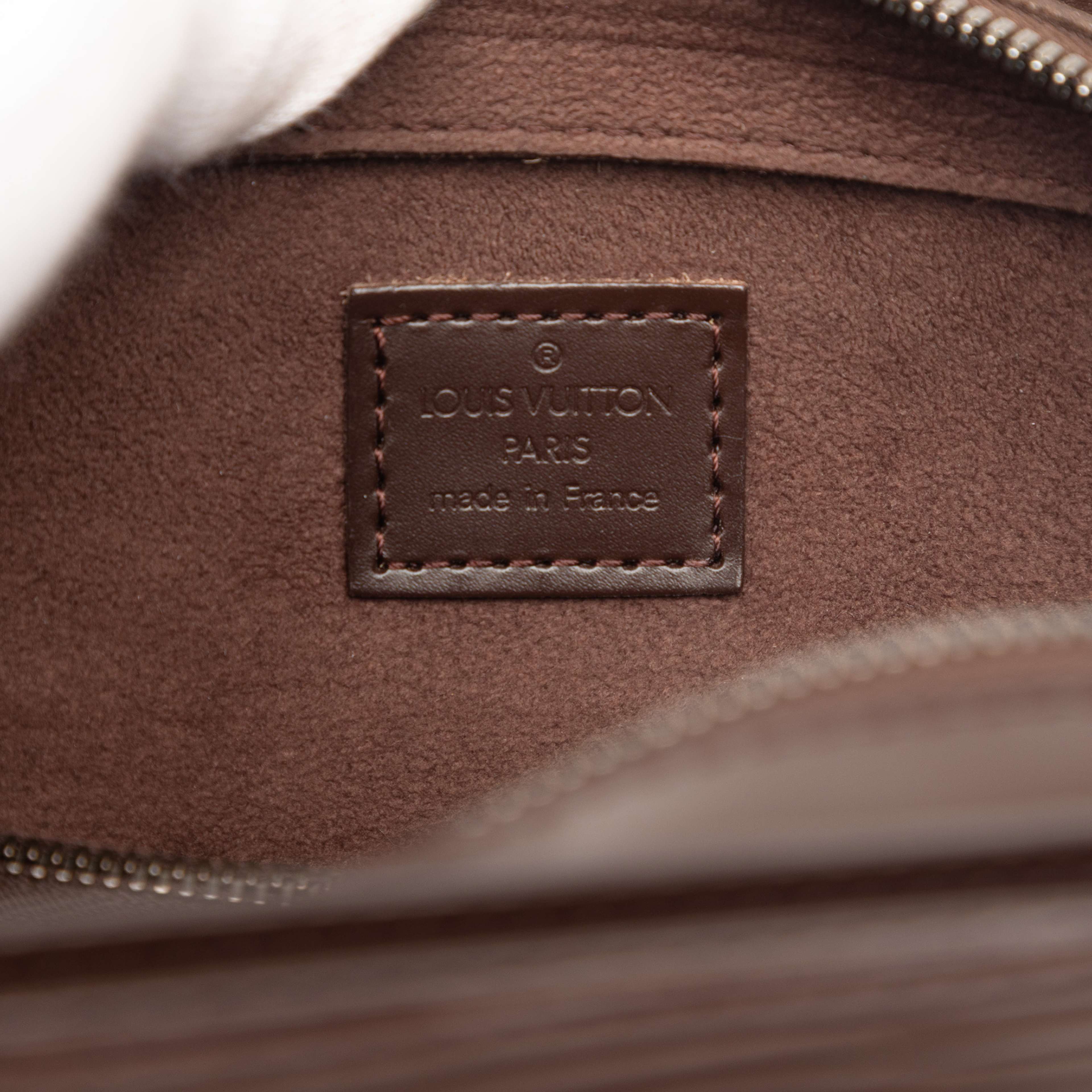 Louis Vuitton Epi Pont Neuf Pm, från Luxclusif, i färgen dark brown. Klicka för att öppna bilden i stort format
