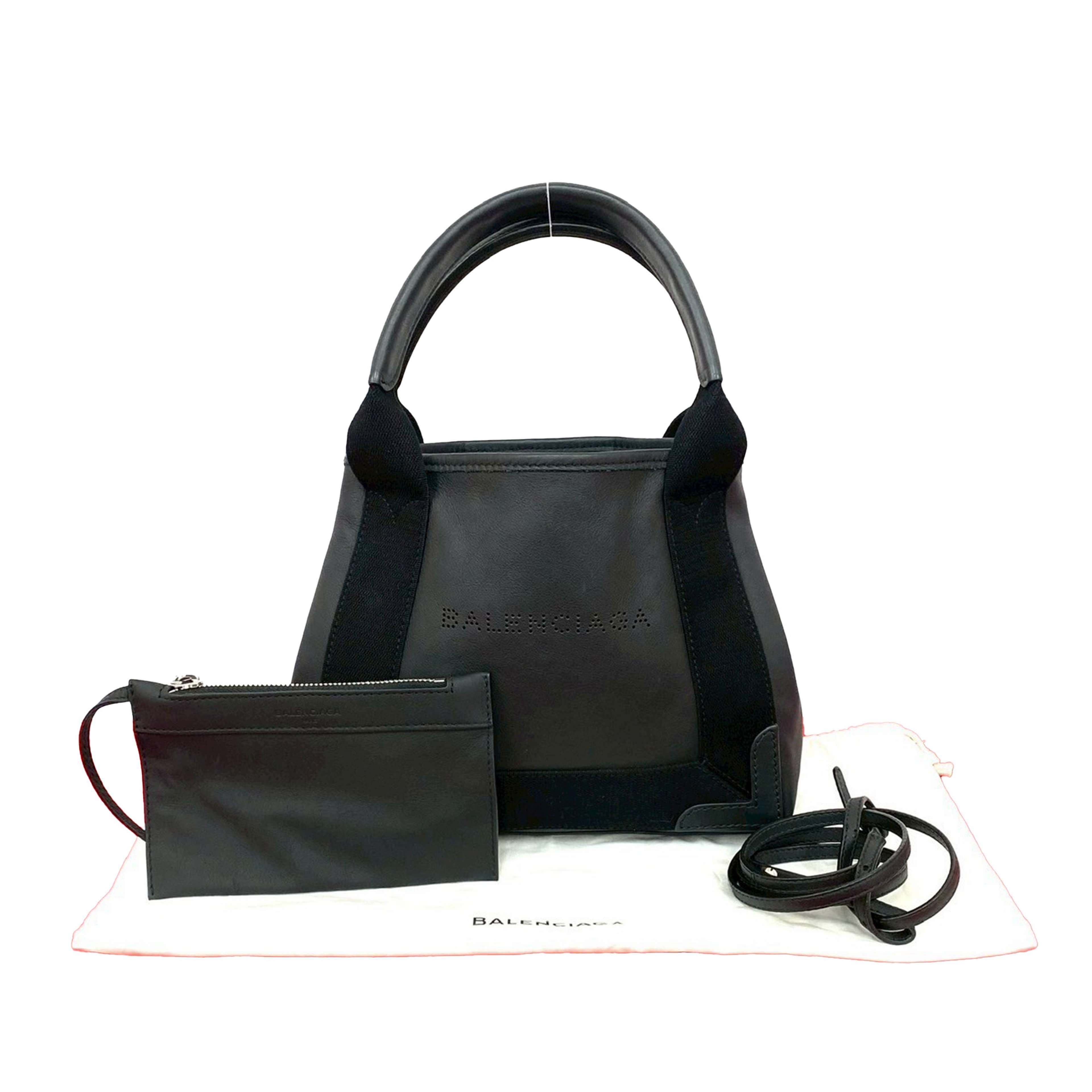 Balenciaga Calfskin Perforated Navy Cabas Tote Xs, från Luxclusif, i färgen svart. Klicka för att öppna bilden i stort format