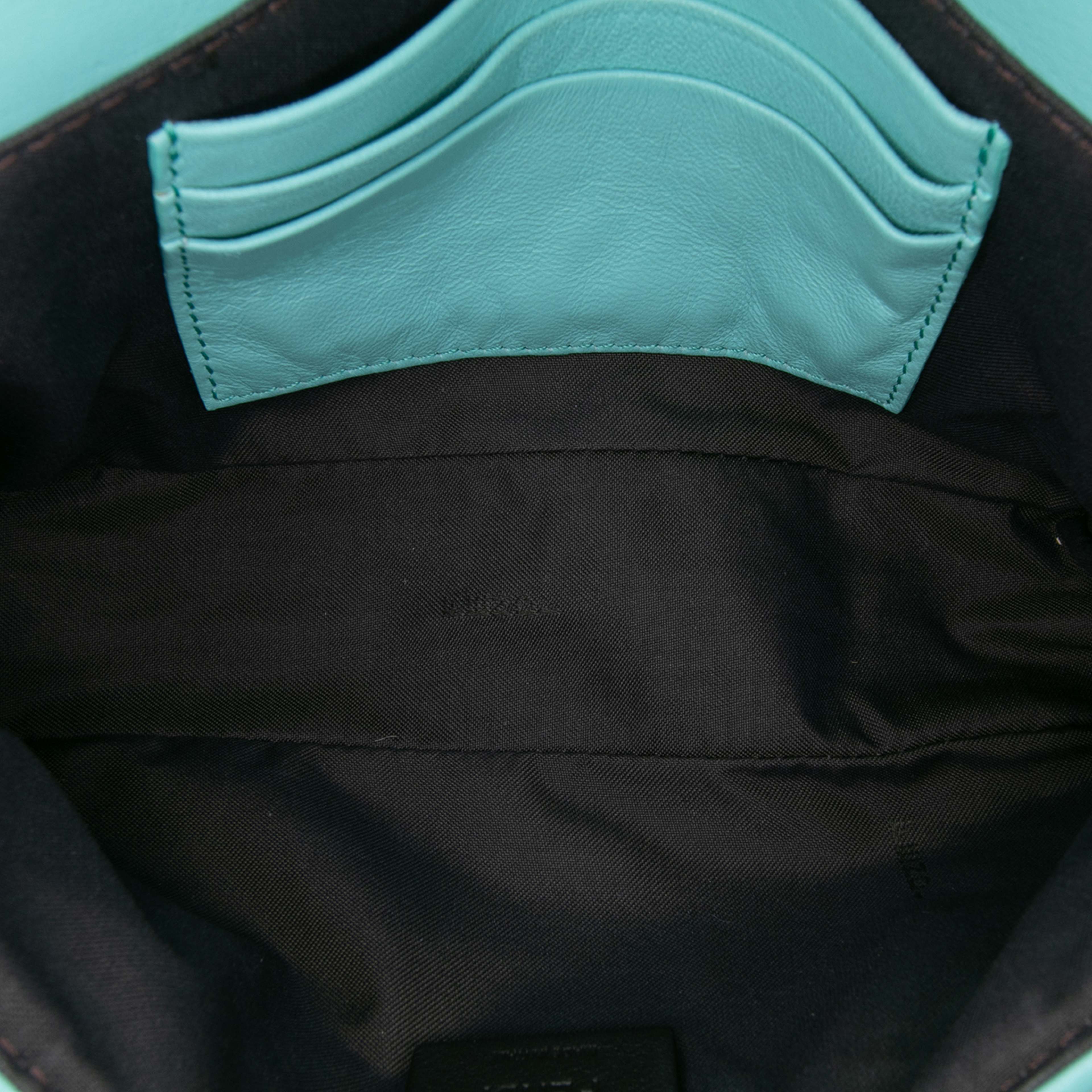 Fendi Mini Zucca Embossed Leather Baguette Satchel, från Luxclusif, i färgen light blue. Klicka för att öppna bilden i stort format