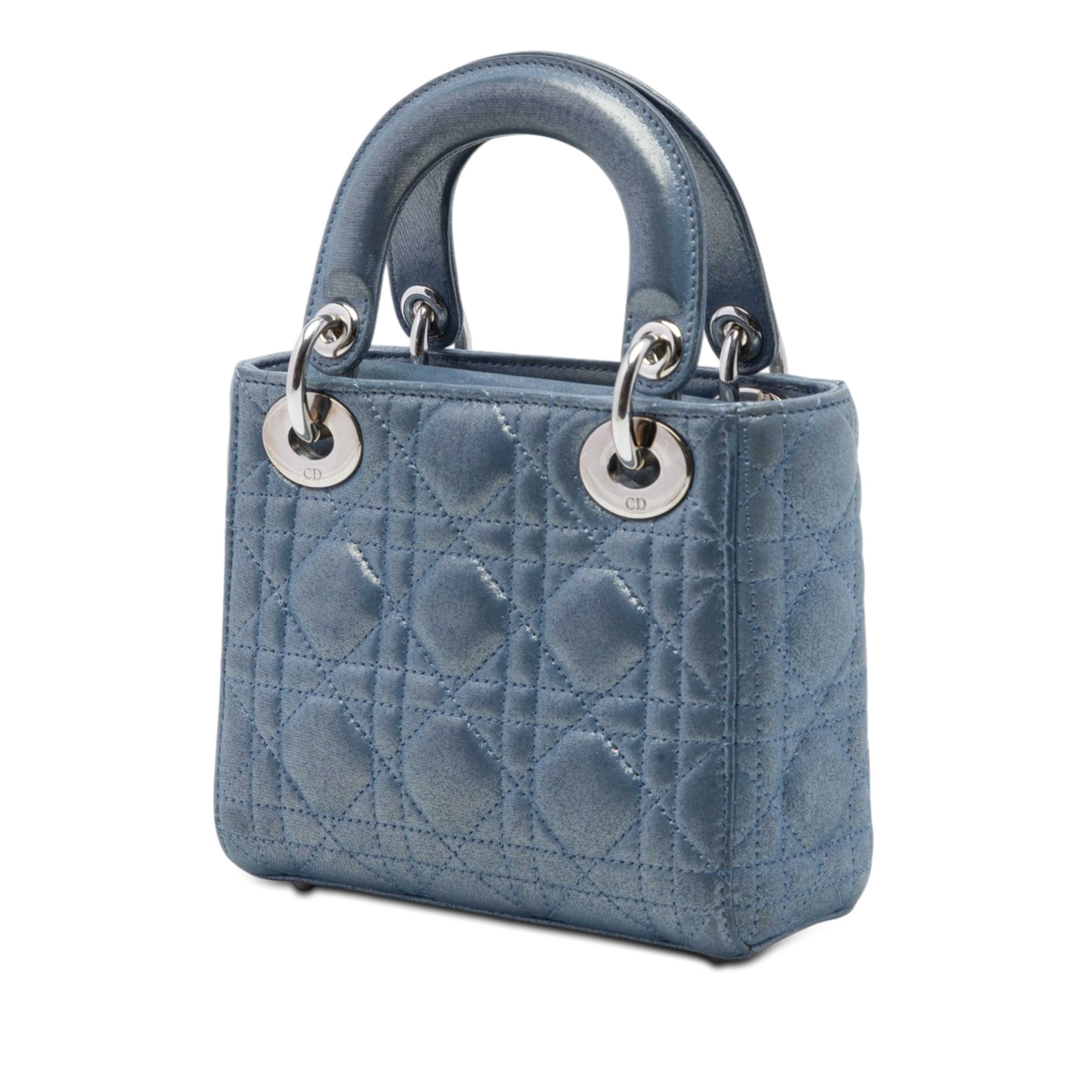 Dior Mini Iridescent Lambskin Cannage Lady Dior, från Luxclusif, i färgen blå. Klicka för att öppna bilden i stort format