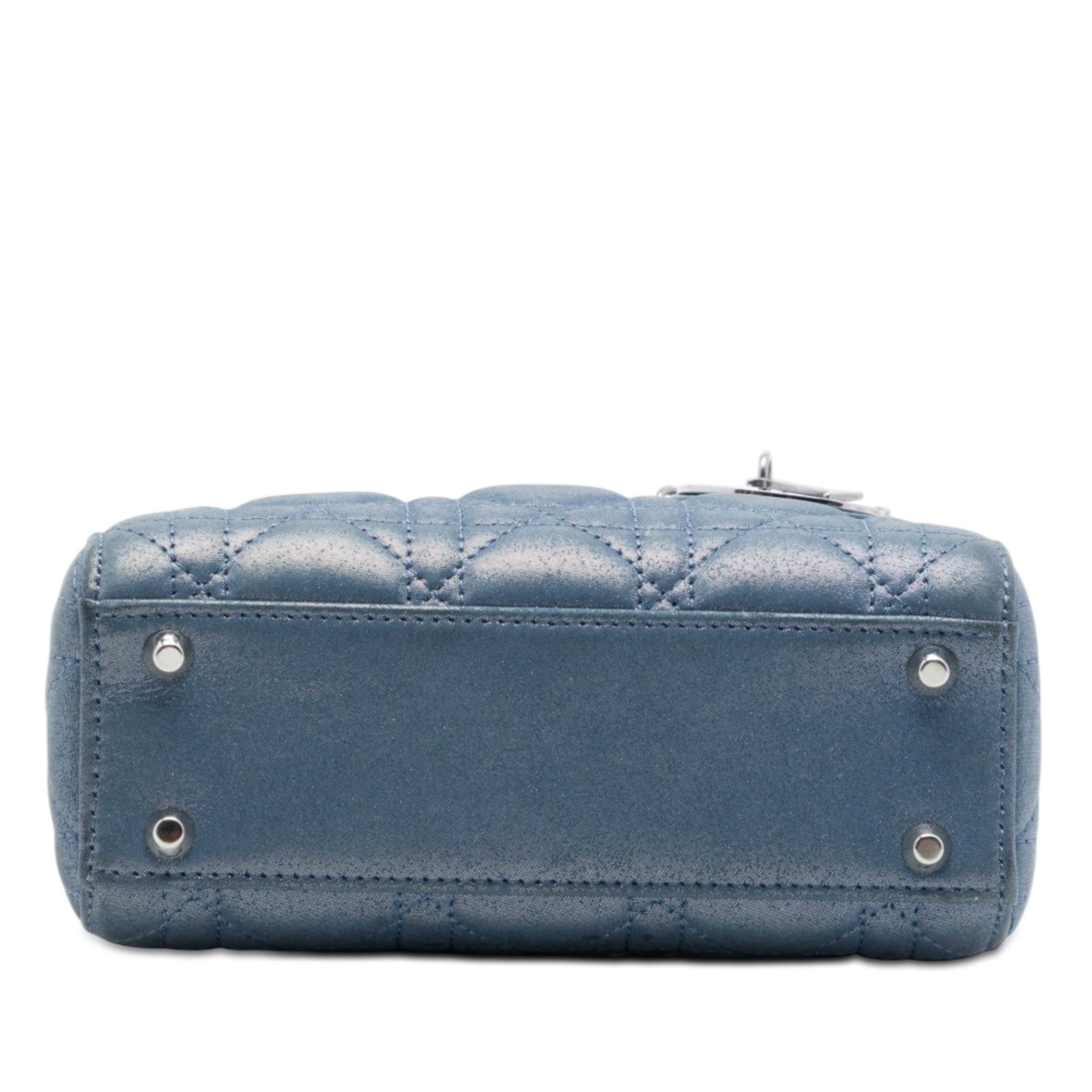 Dior Mini Iridescent Lambskin Cannage Lady Dior, från Luxclusif, i färgen blå. Klicka för att öppna bilden i stort format
