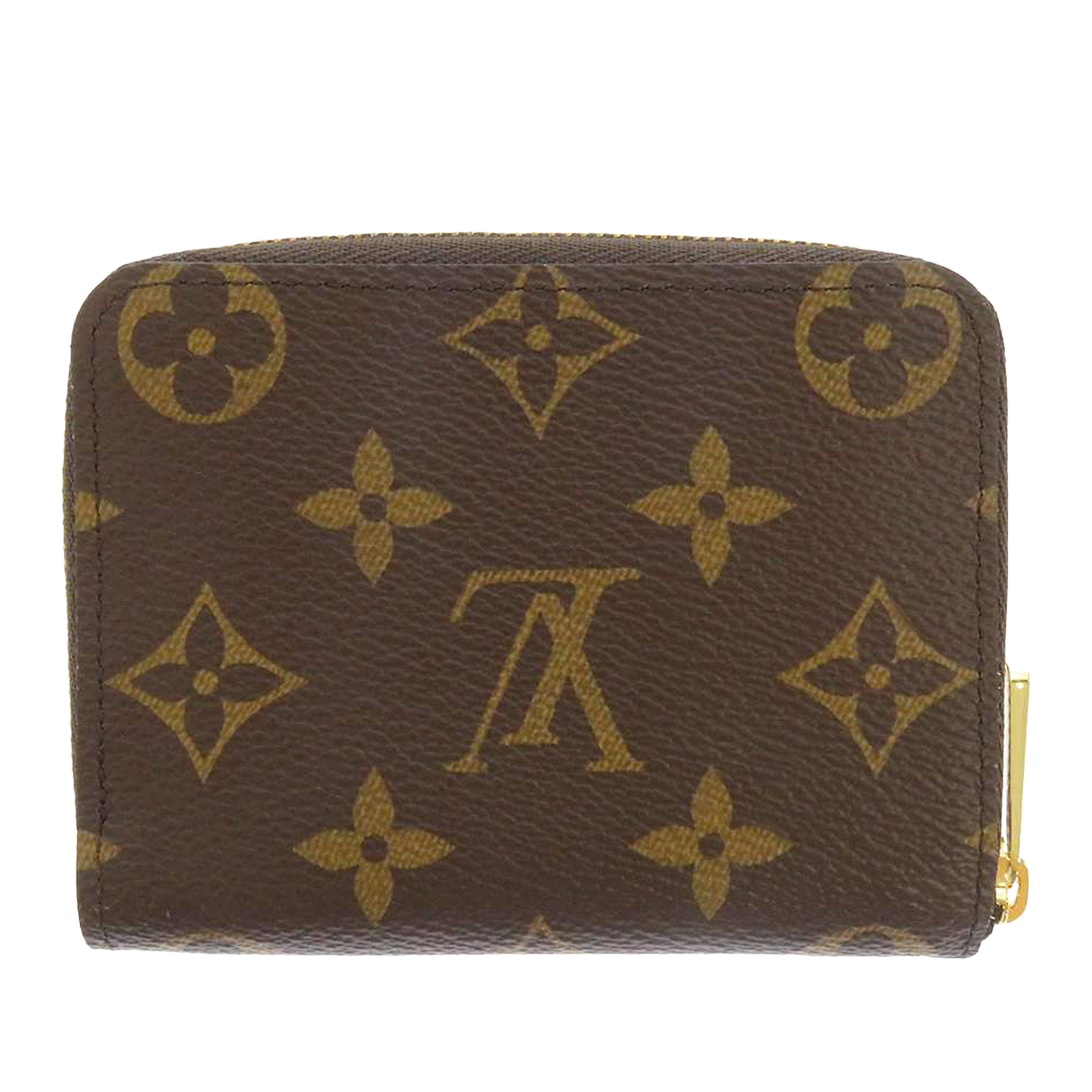 Louis Vuitton Monogram Zippy Coin Pouch, från Luxclusif, i färgen brun. Klicka för att öppna bilden i stort format