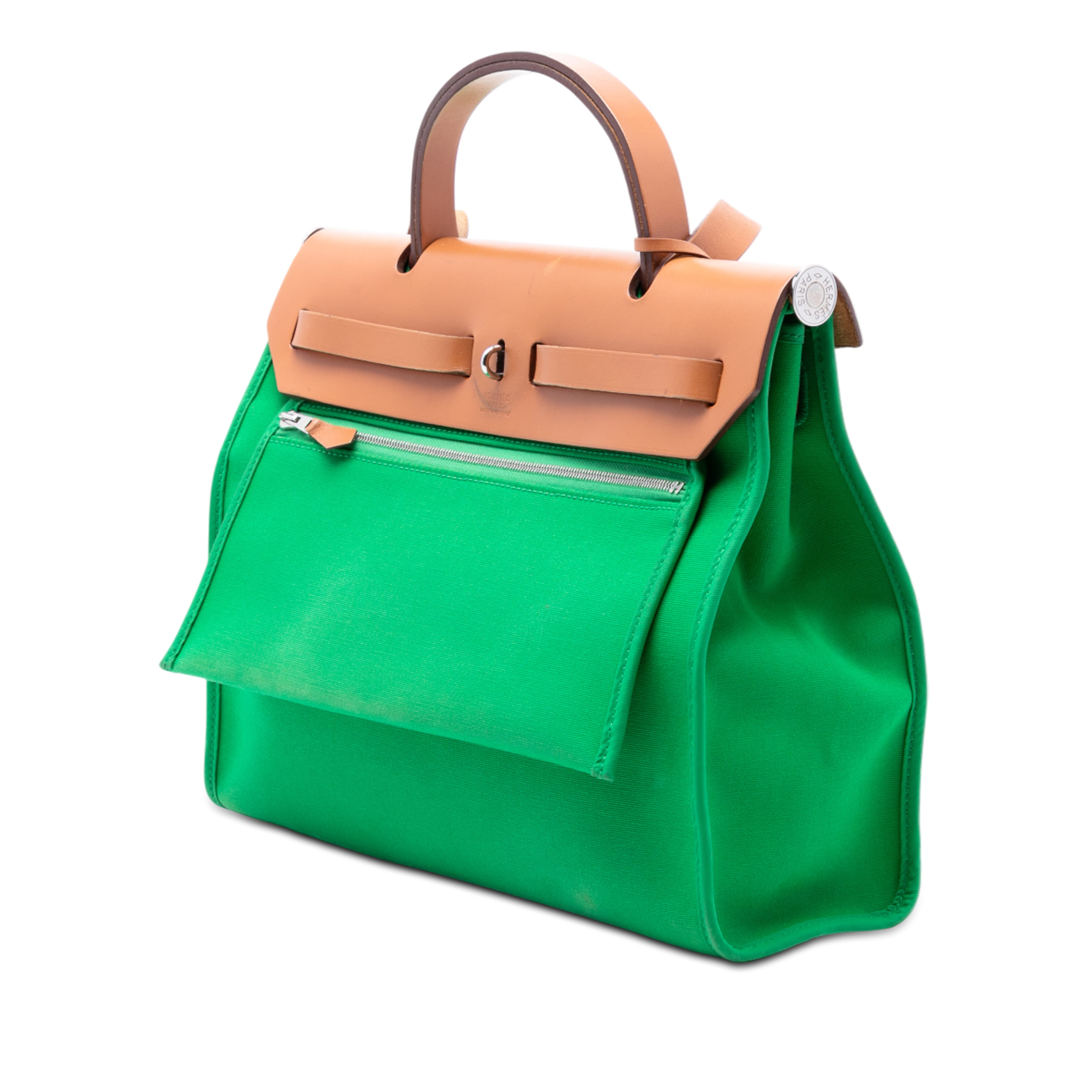 Hermès Toile Herbag Zip 31, från Luxclusif, i färgen lime. Klicka för att öppna bilden i stort format