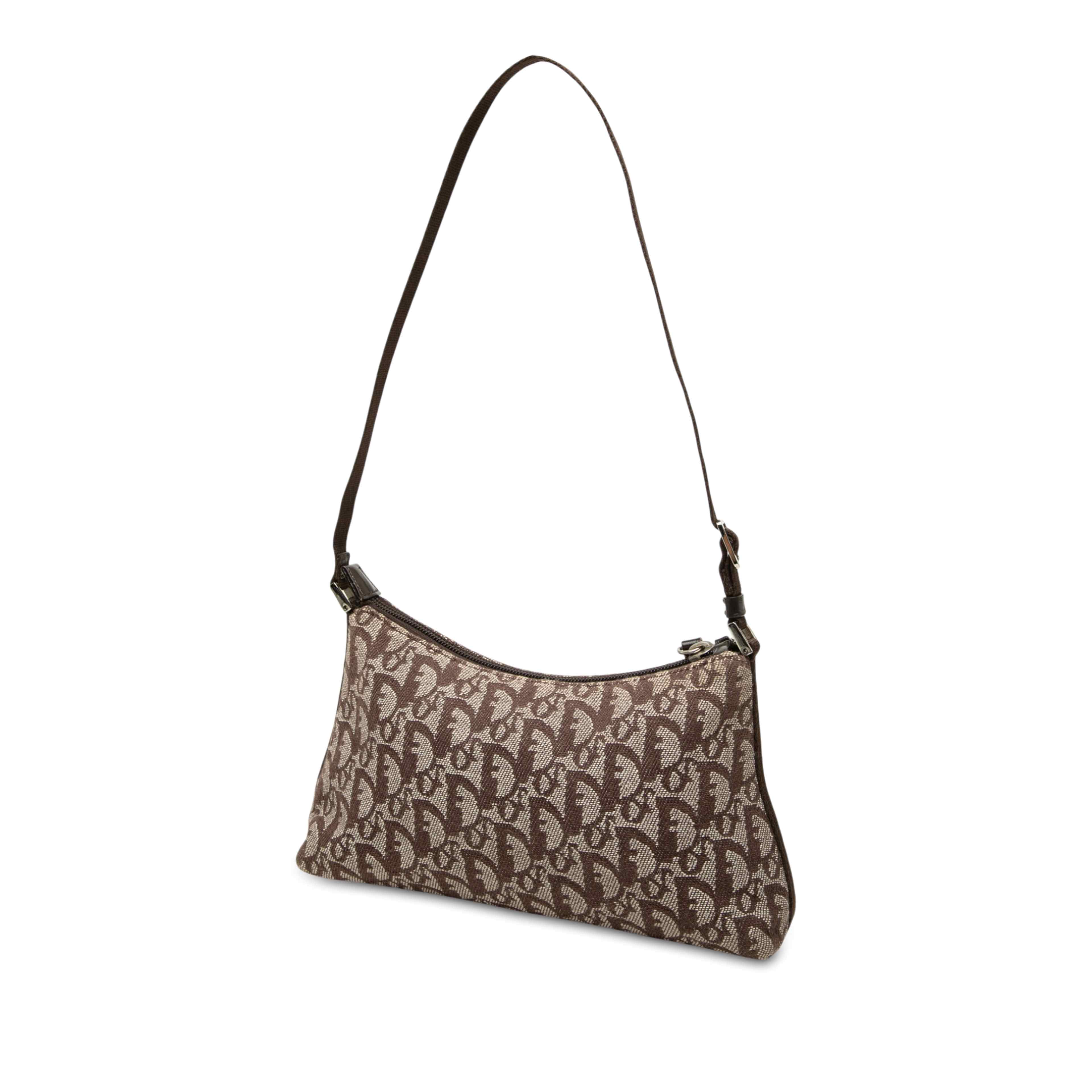 Dior Diorissimo Trotter Canvas Pochette, från Luxclusif, i färgen brun. Klicka för att öppna bilden i stort format
