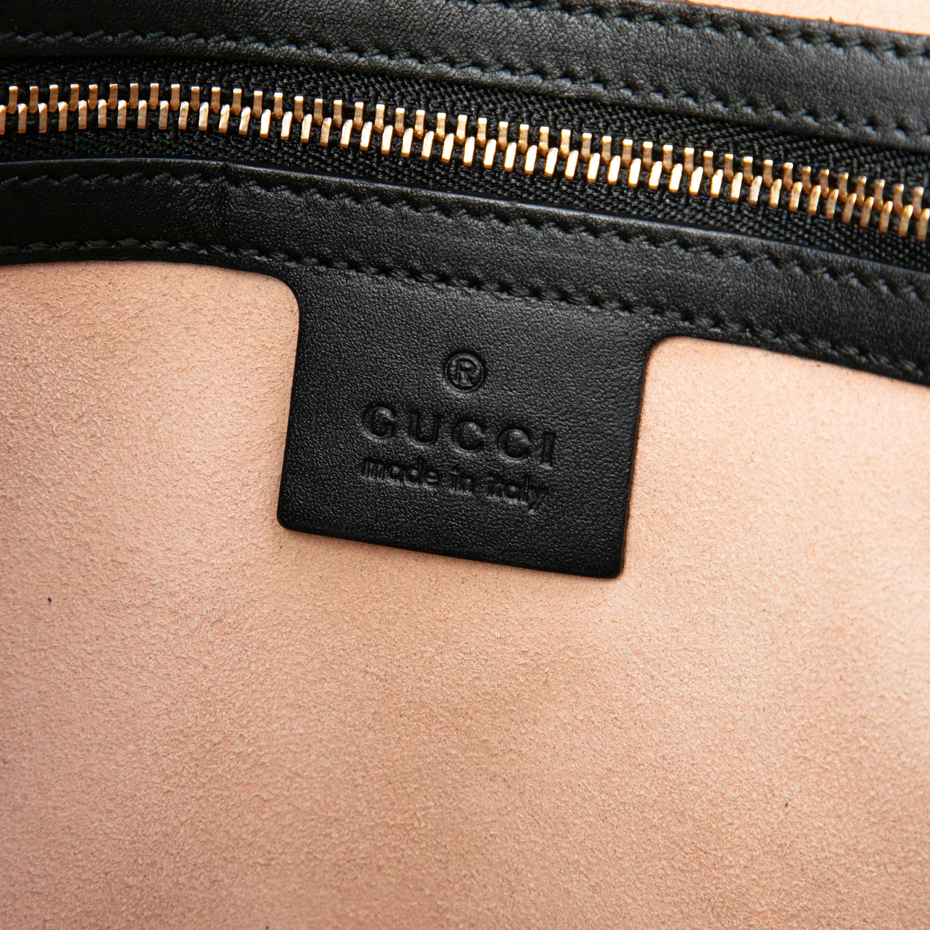 Gucci Guccissima Linea A Fold Over Satchel, från Luxclusif, i färgen svart. Klicka för att öppna bilden i stort format