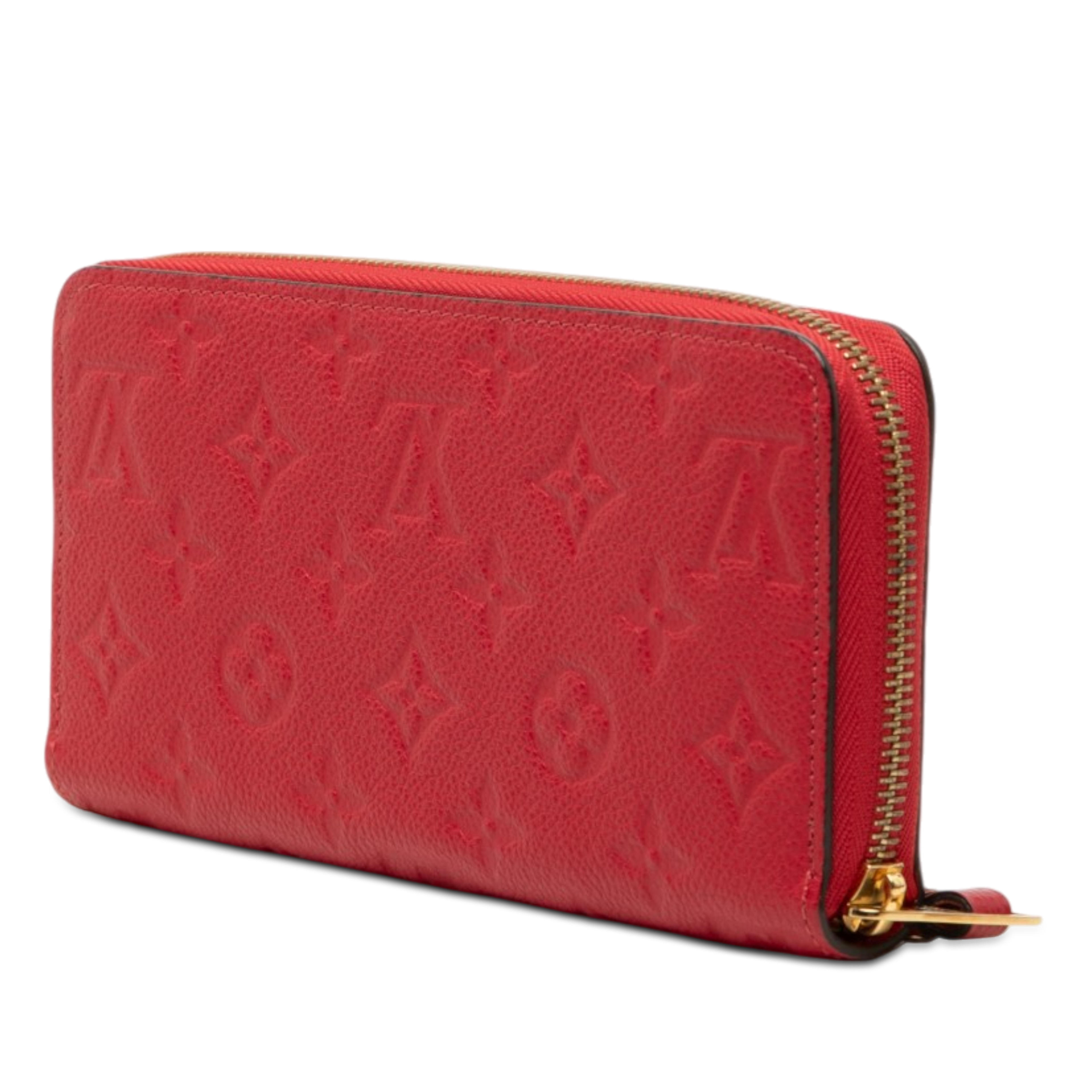 Louis Vuitton Monogram Empreinte Zippy Long Wallet, från Luxclusif, i färgen röd. Klicka för att öppna bilden i stort format