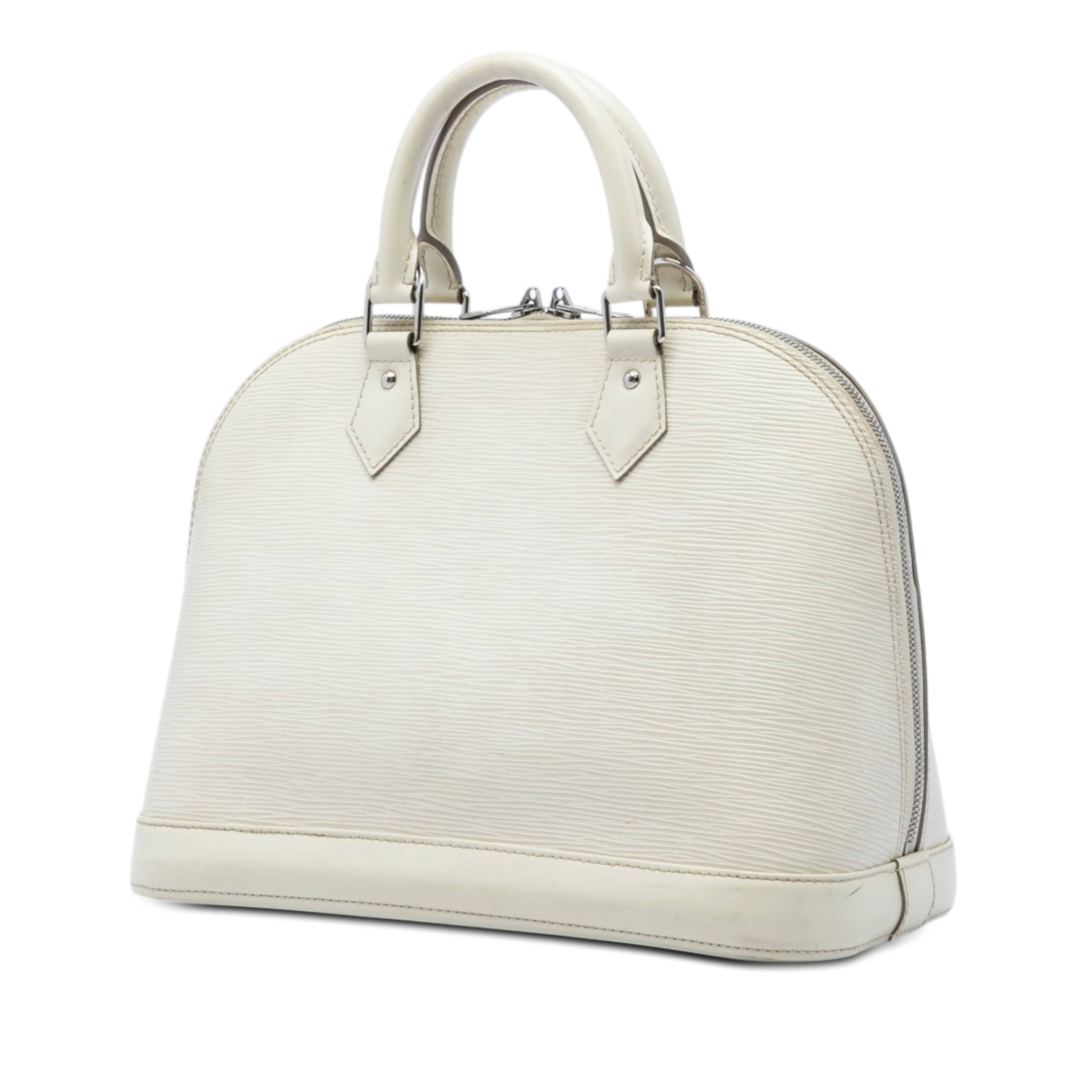 Louis Vuitton Epi Alma Pm, från Luxclusif, i färgen vit. Klicka för att öppna bilden i stort format