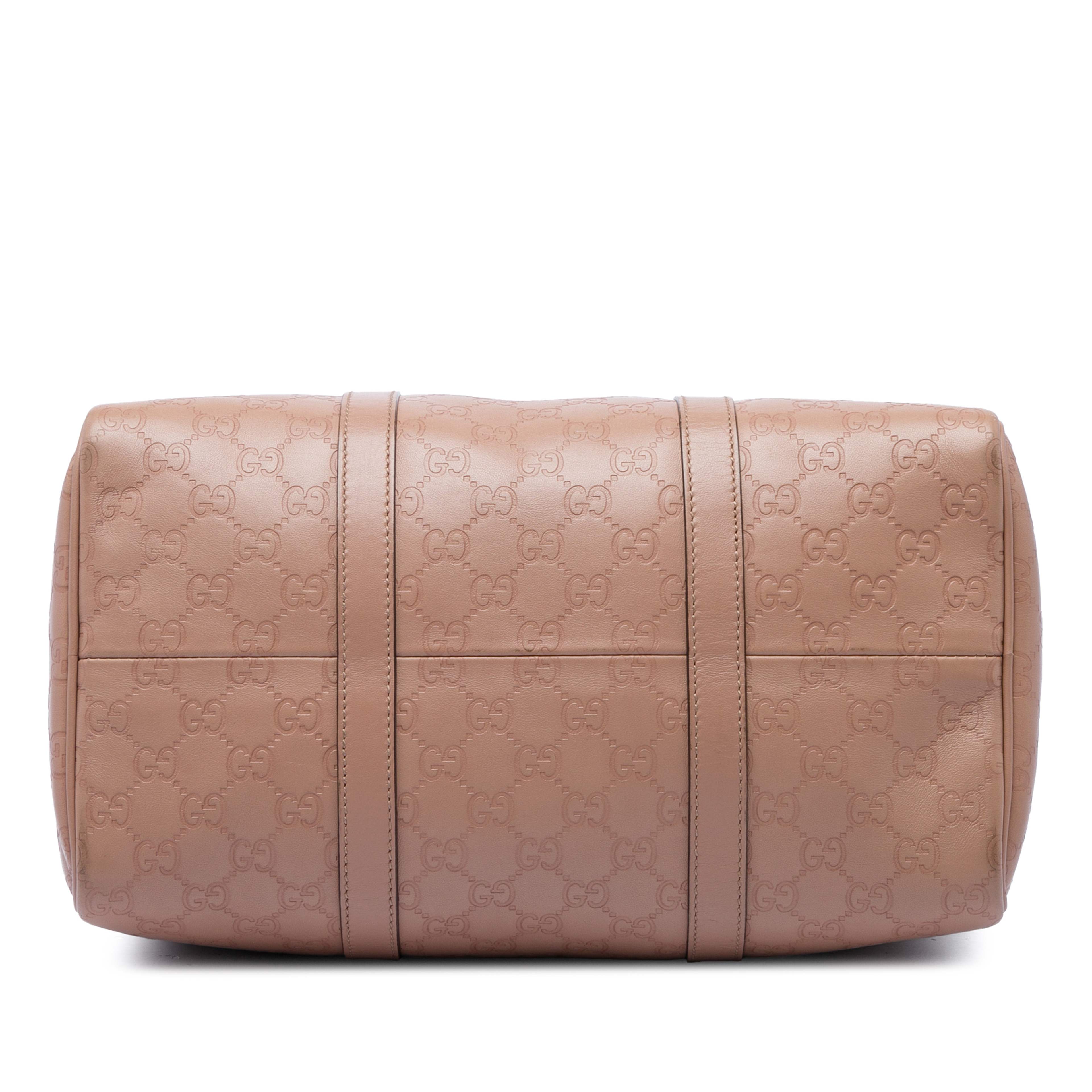 Gucci Medium Guccissima Joy Boston Bag, från Luxclusif, i färgen brun. Klicka för att öppna bilden i stort format