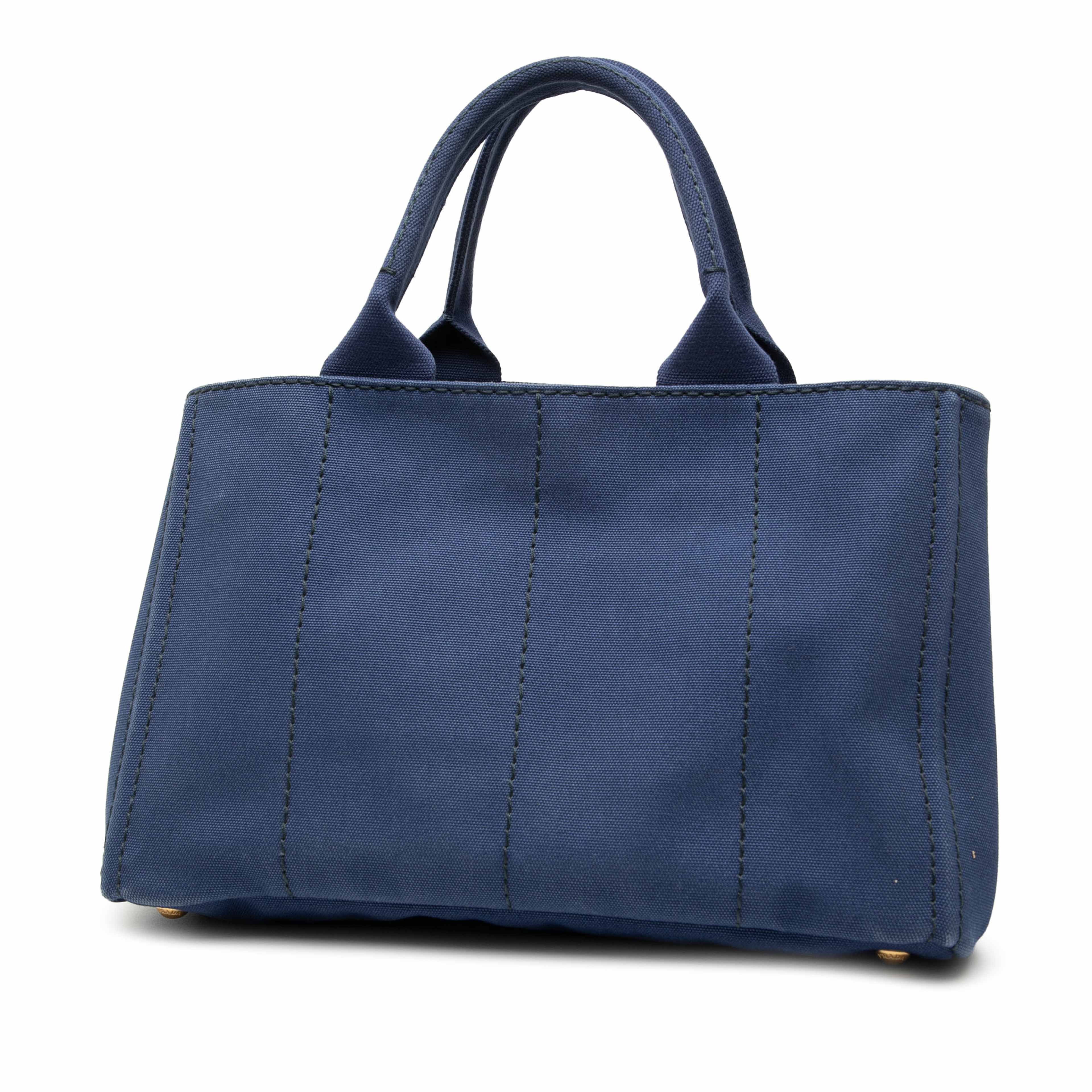 Prada Canvas Canapa Logo Tote, från Luxclusif, i färgen dark blue. Klicka för att öppna bilden i stort format