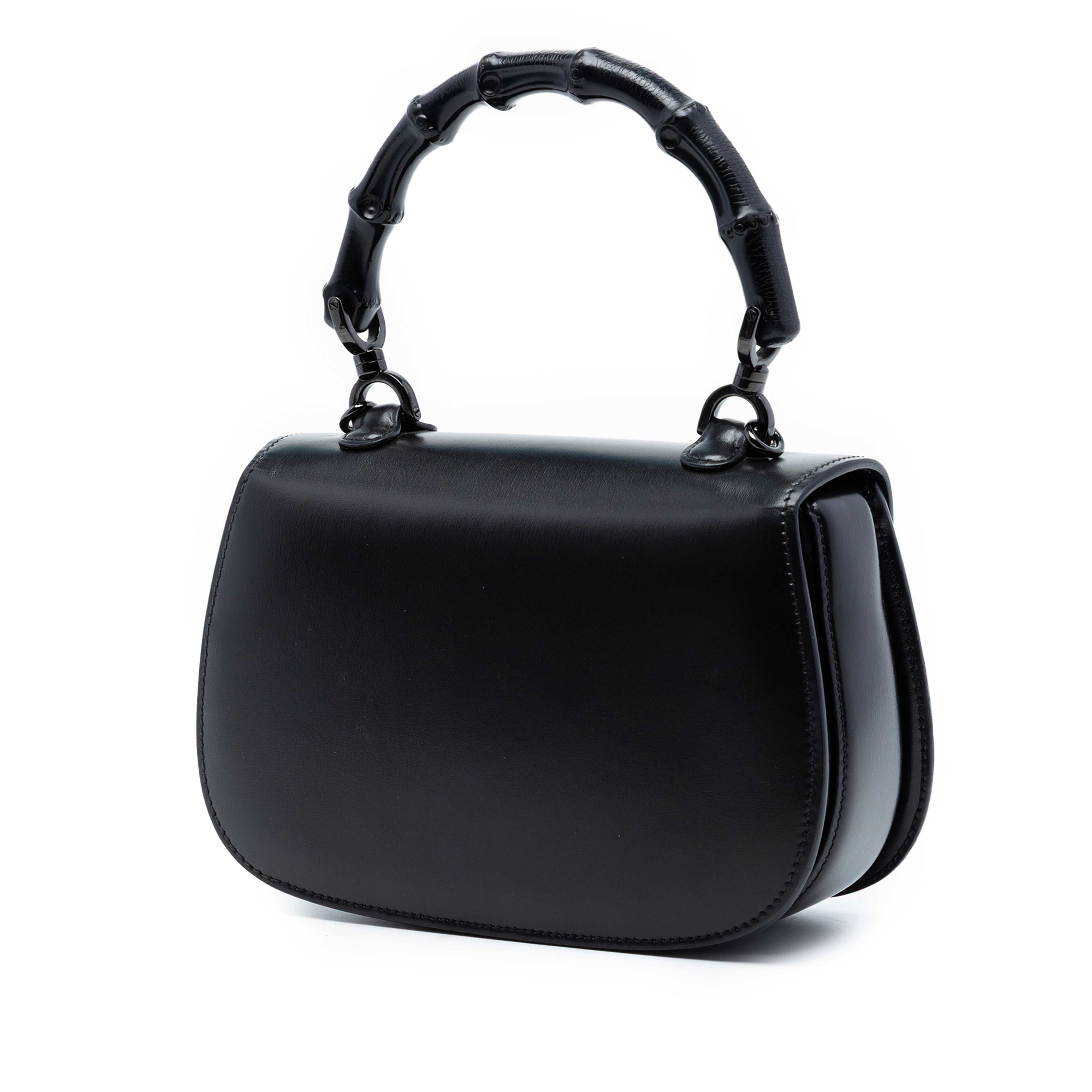 Gucci Small Calfskin 1947 Bamboo Top Handle Bag, från Luxclusif, i färgen black. Klicka för att öppna bilden i stort format