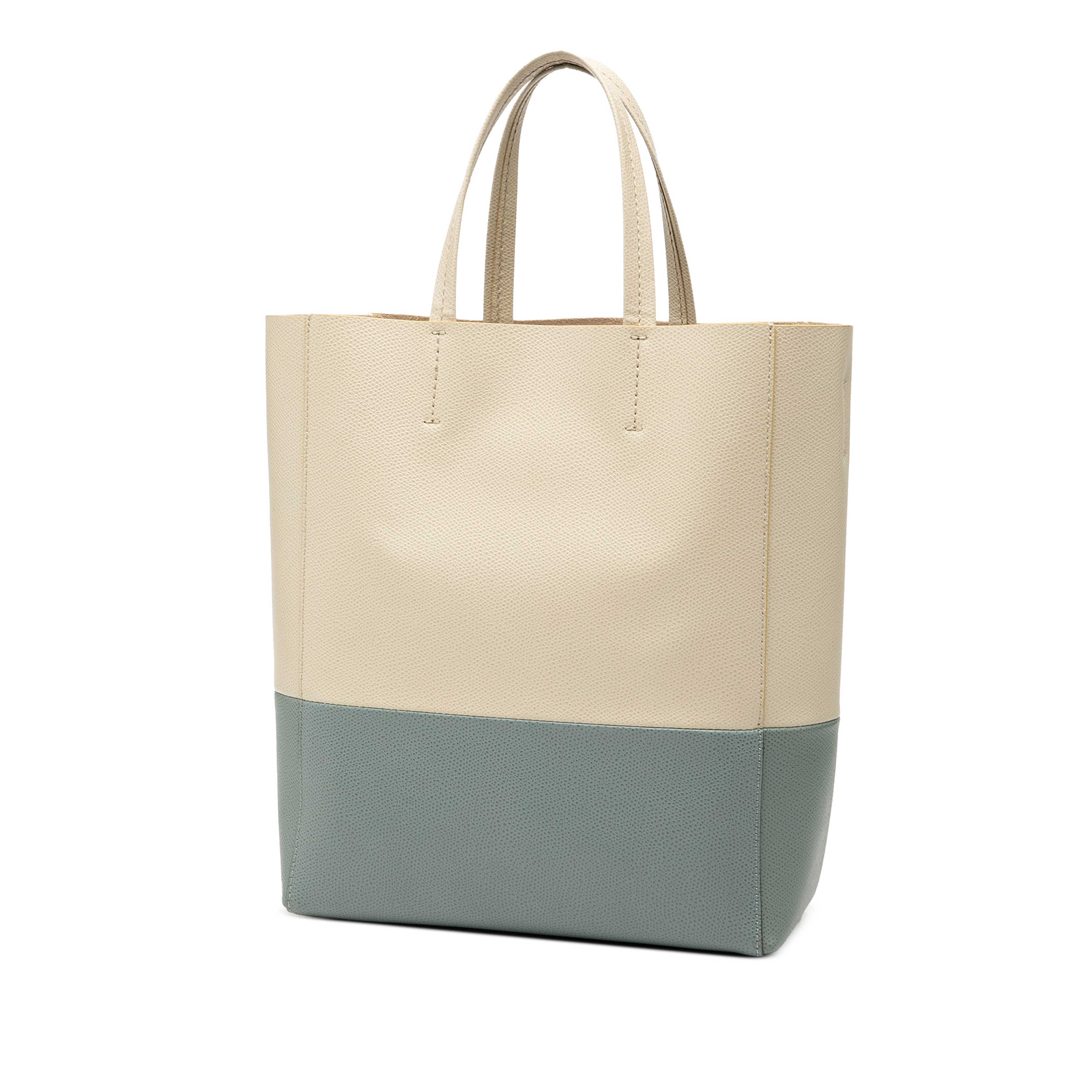 Celine Small Bicolor Grained Calfskin Vertical Cabas Tote, från Luxclusif, i färgen beige. Klicka för att öppna bilden i stort format
