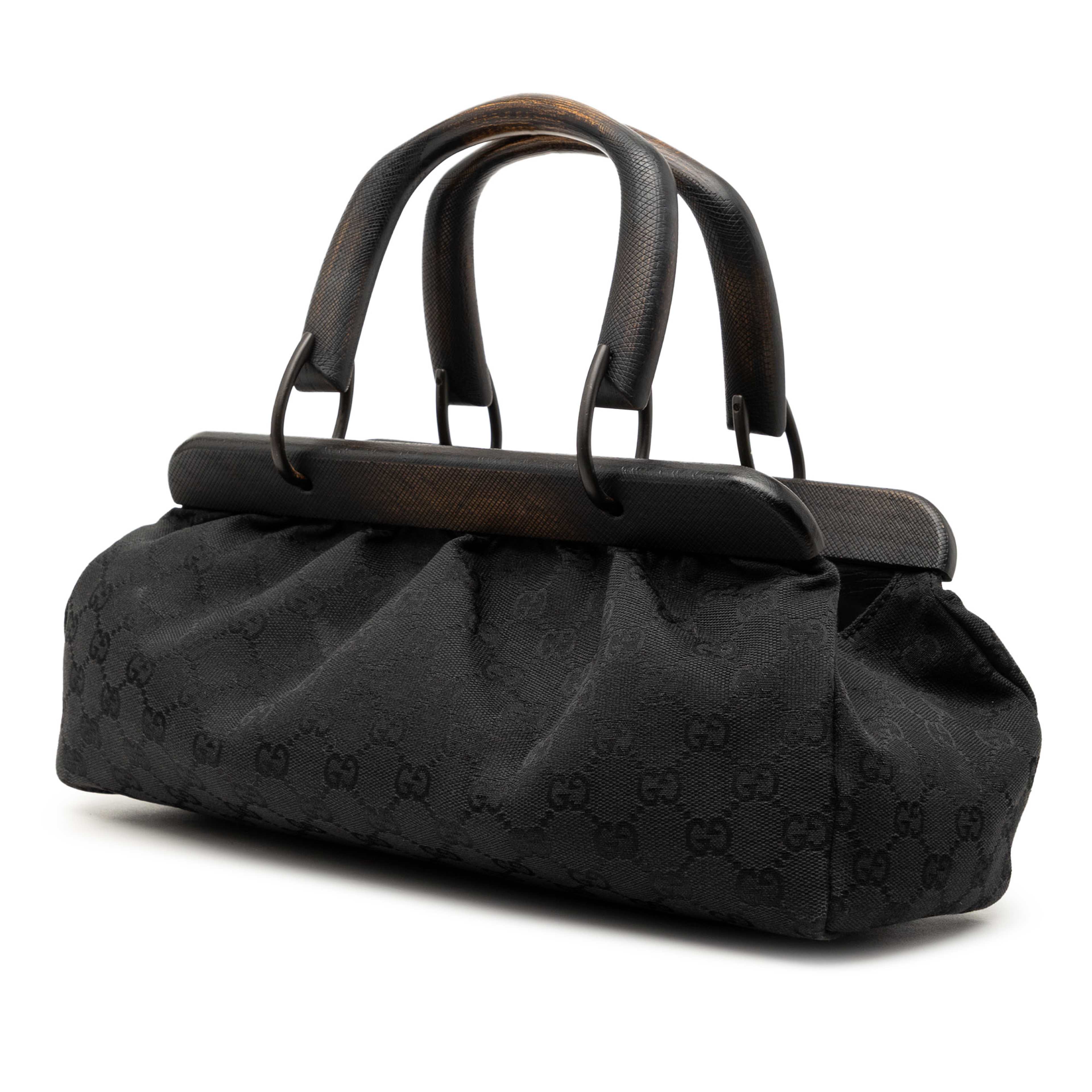 Gucci Gg Canvas Wood Frame Handbag, från Luxclusif, i färgen svart. Klicka för att öppna bilden i stort format