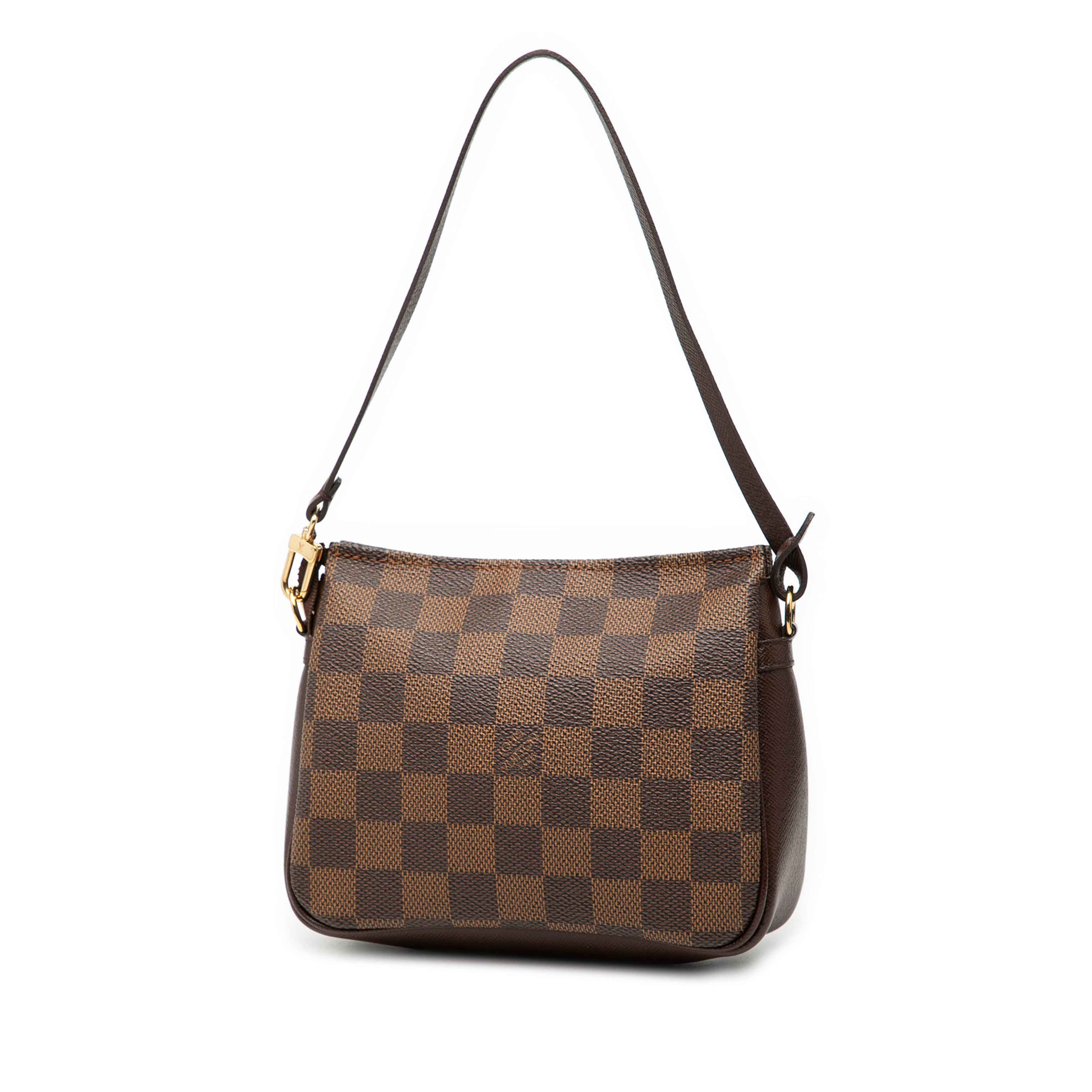 Louis Vuitton Damier Ebene Trousse Pochette, från Luxclusif, i färgen brown. Klicka för att öppna bilden i stort format