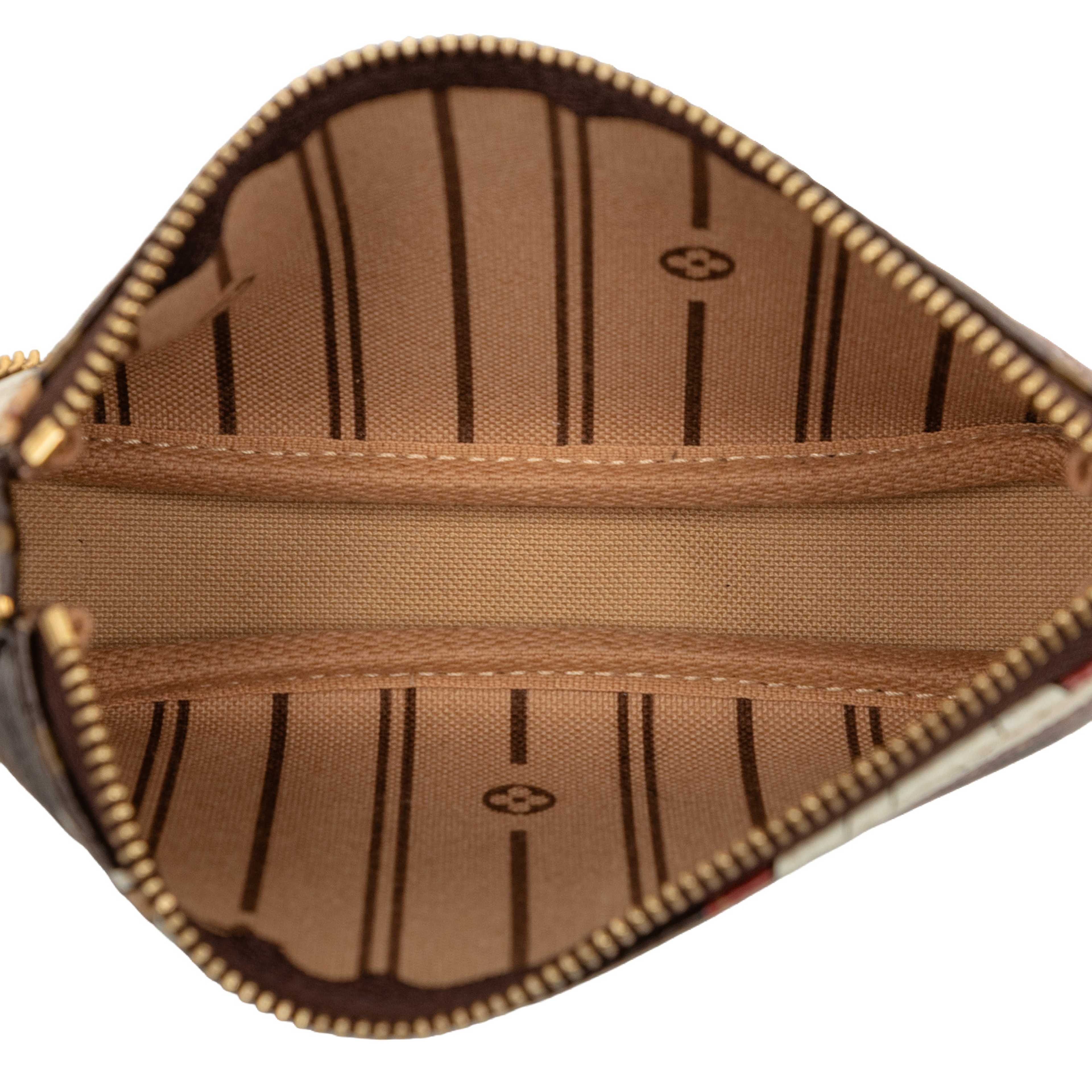 Louis Vuitton Monogram Patch Mini Pochette Accessoires, från Luxclusif, i färgen brun. Klicka för att öppna bilden i stort format