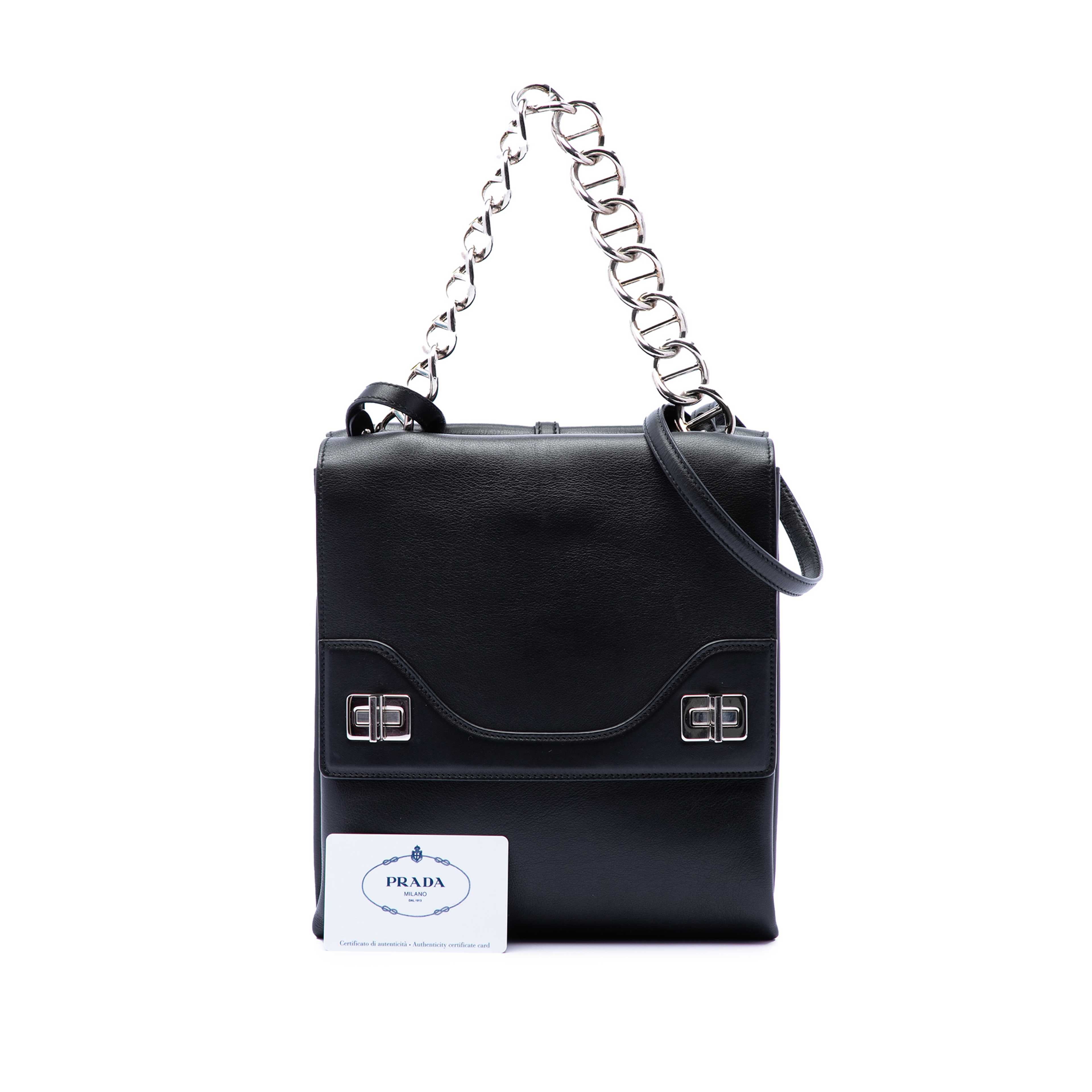 Prada Soft Calf Double Turnlock Satchel, från Luxclusif, i färgen svart. Klicka för att öppna bilden i stort format