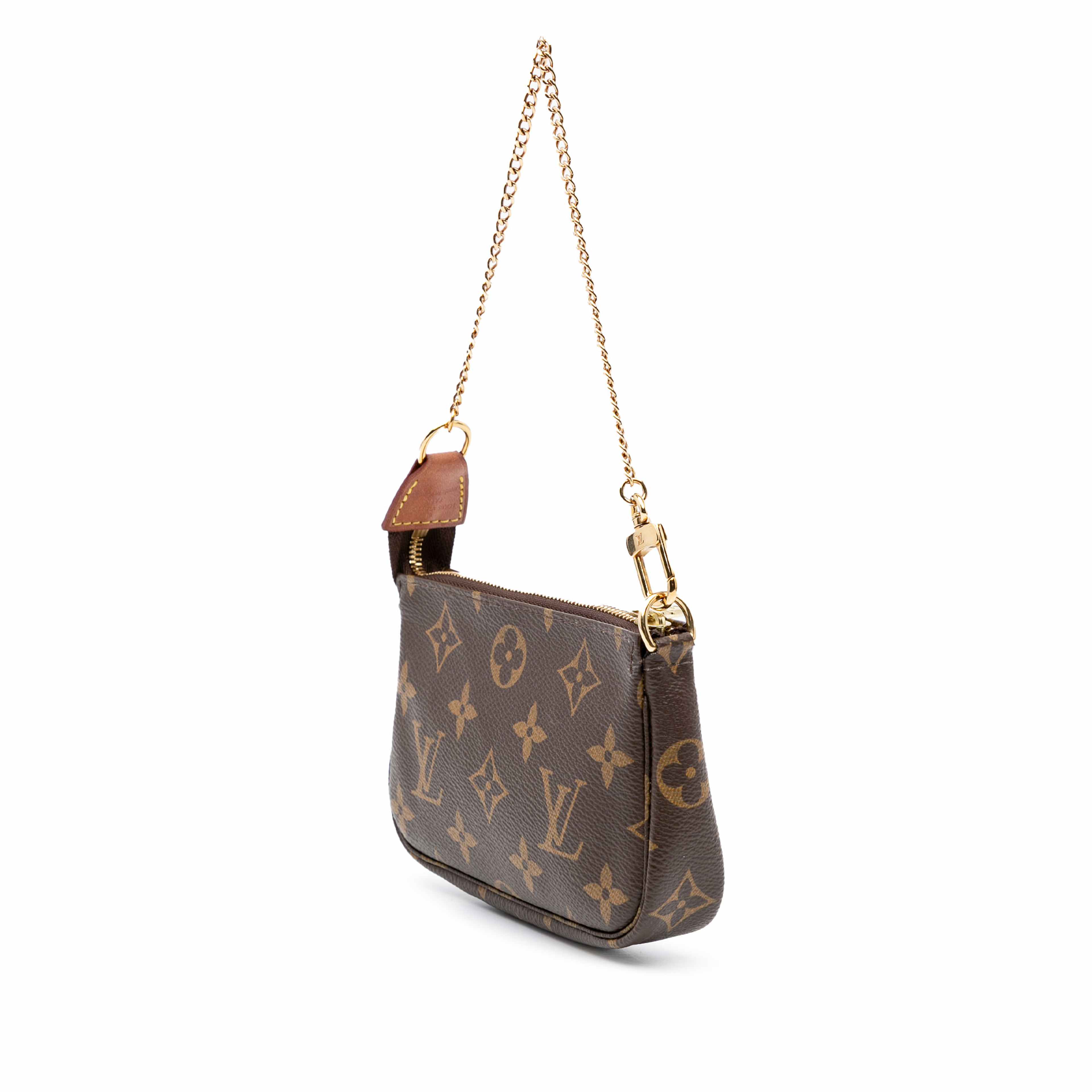 Louis Vuitton Monogram Mini Pochette Accessoires, från Luxclusif, i färgen brown. Klicka för att öppna bilden i stort format