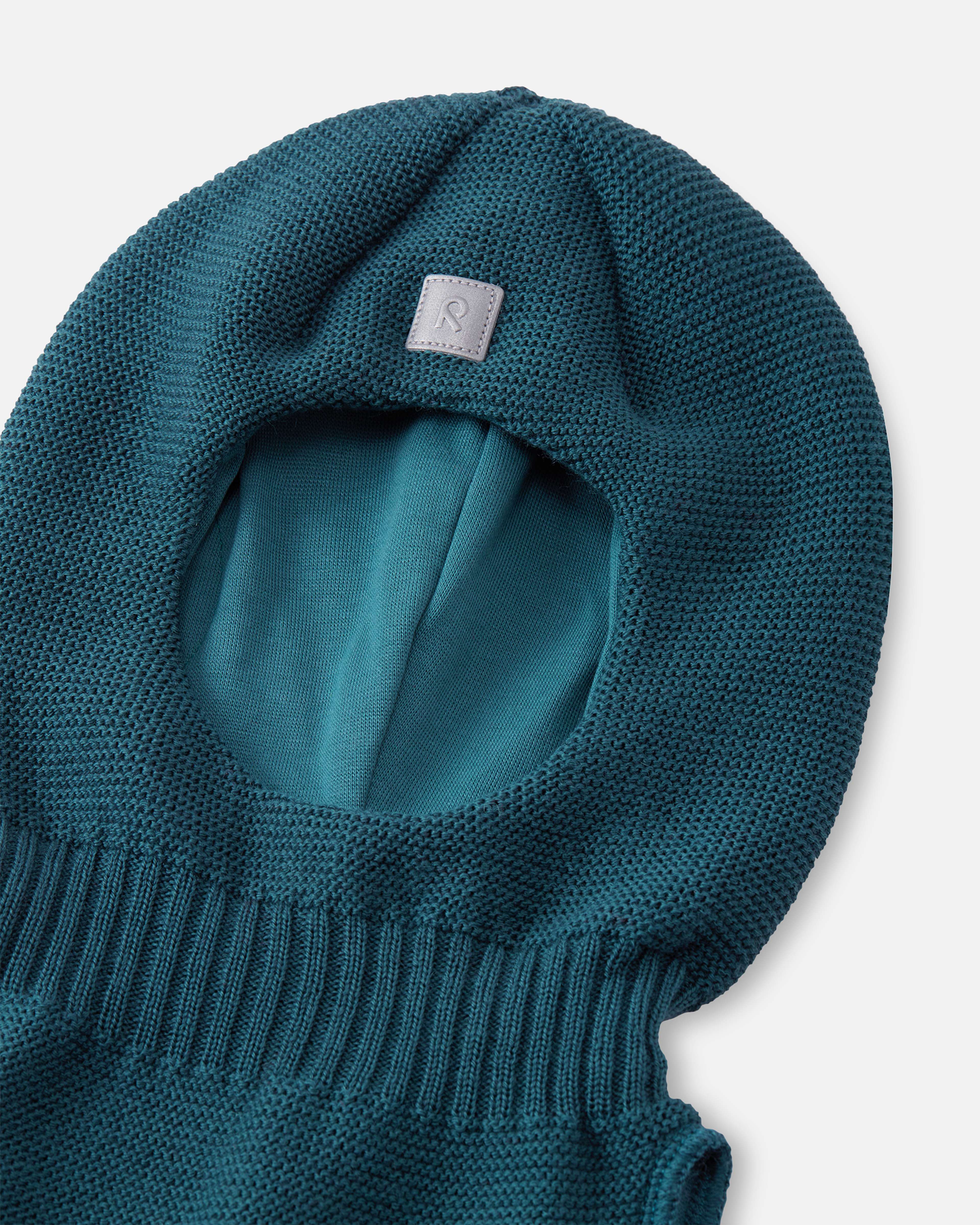 Balaclava Starrie, från Reima, i färgen dark teal. Klicka för att öppna bilden i stort format