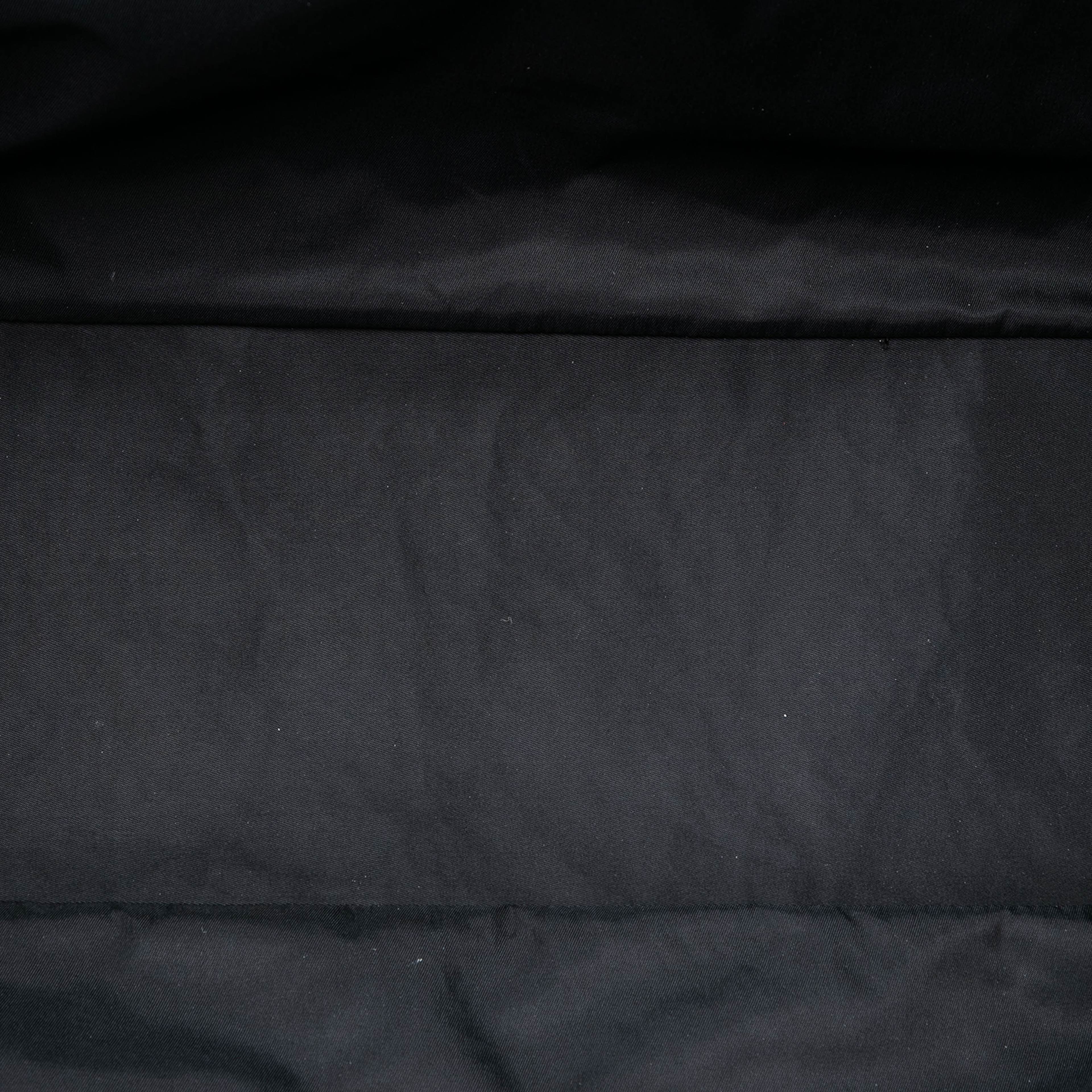 Chanel Xl Quilted Coated Canvas Paris Biarritz Tote, från Luxclusif, i färgen black. Klicka för att öppna bilden i stort format