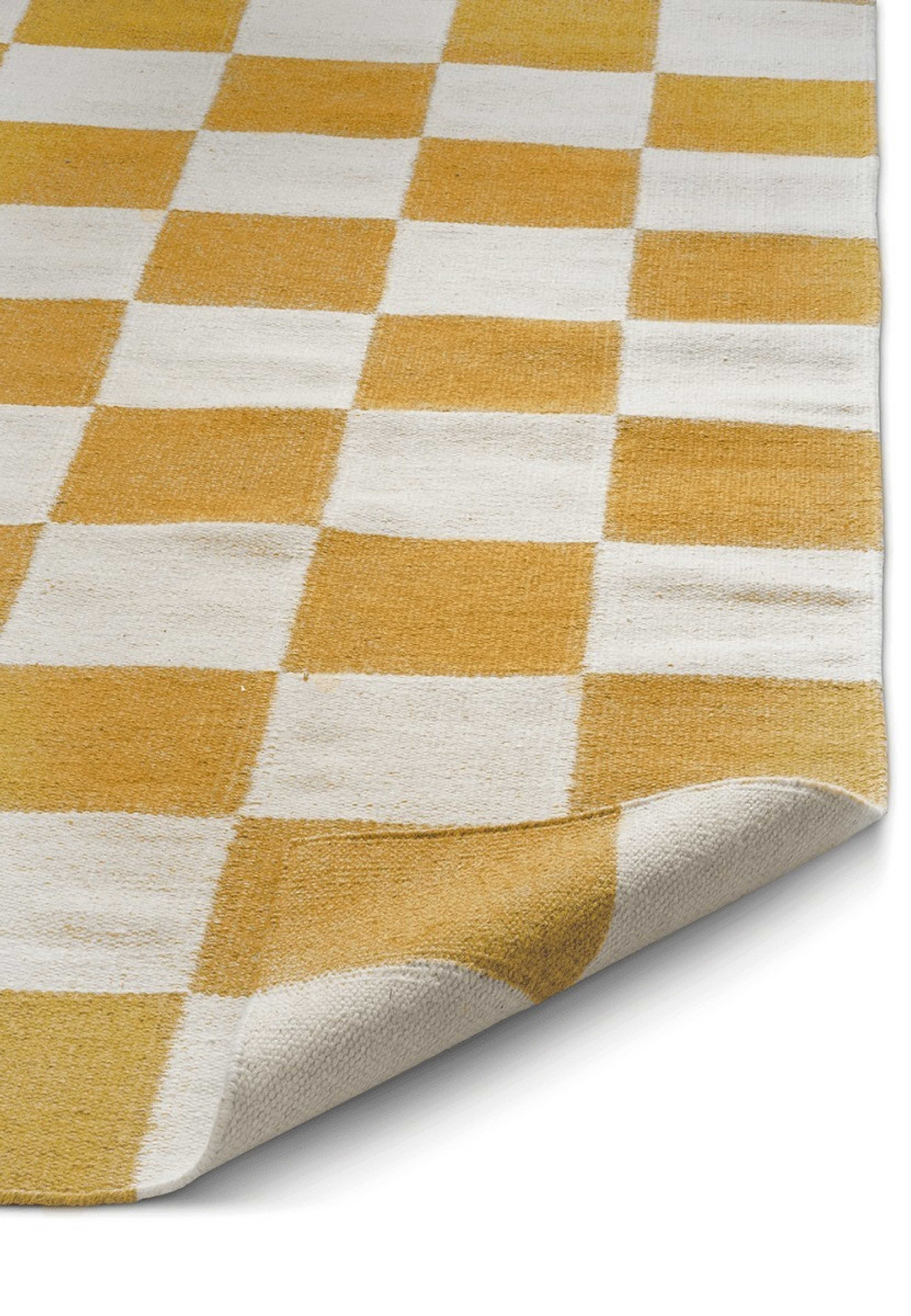 Matta Squares 170x230, från Classic Collection, i färgen vit/gul. Klicka för att öppna bilden i stort format