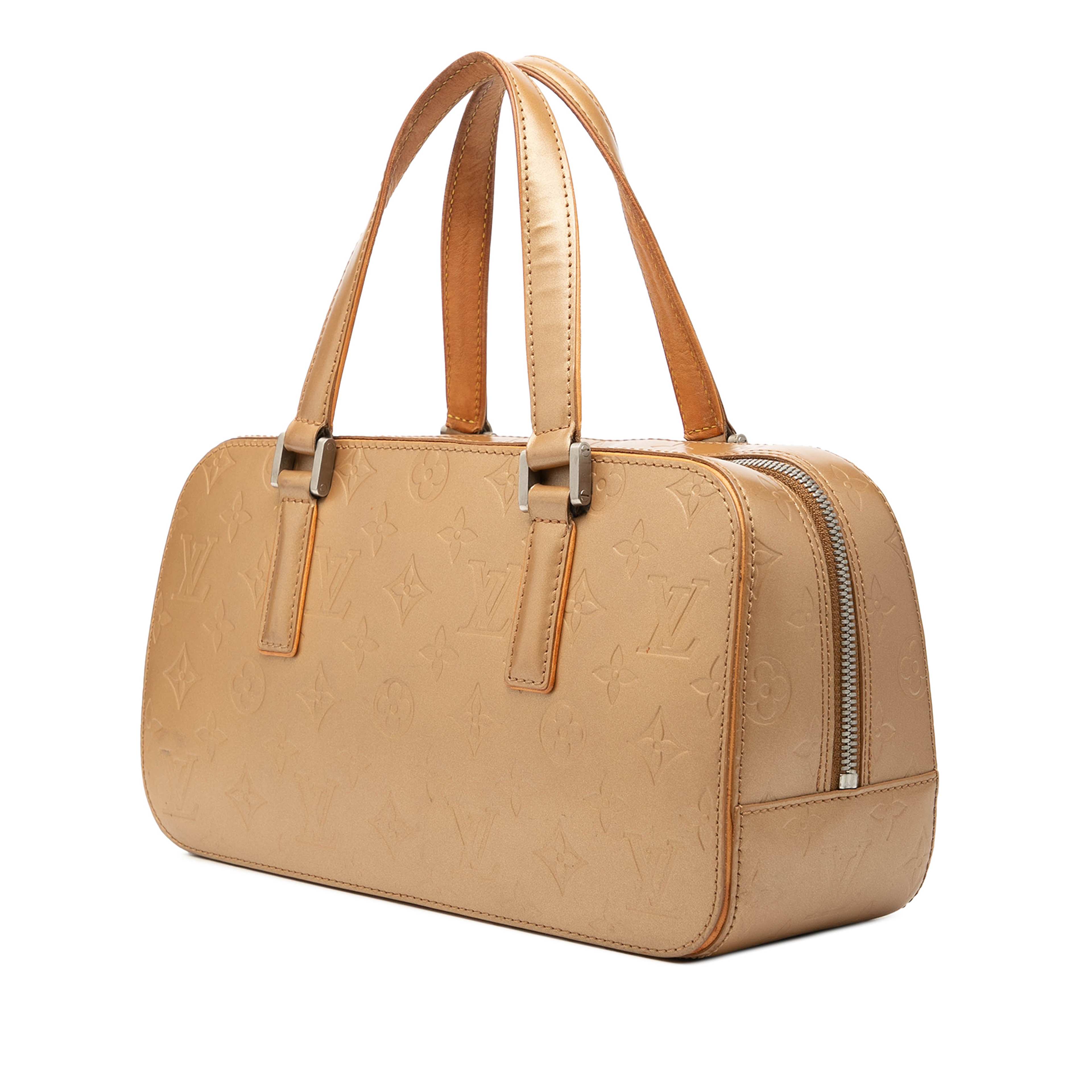 Louis Vuitton Monogram Mat Shelton, från Luxclusif, i färgen gold. Klicka för att öppna bilden i stort format