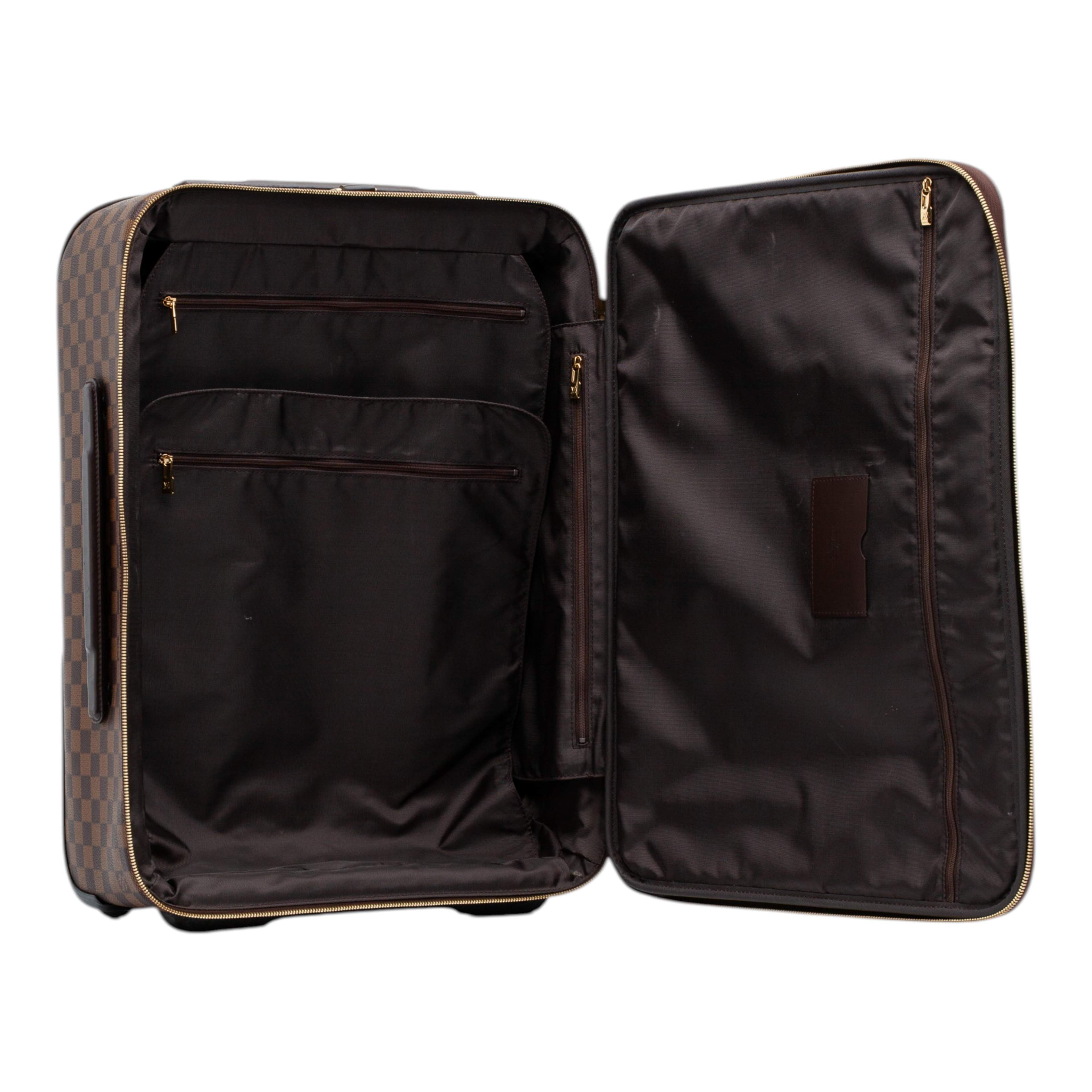 Louis Vuitton Damier Ebene Pegase 50, från Luxclusif, i färgen brown. Klicka för att öppna bilden i stort format