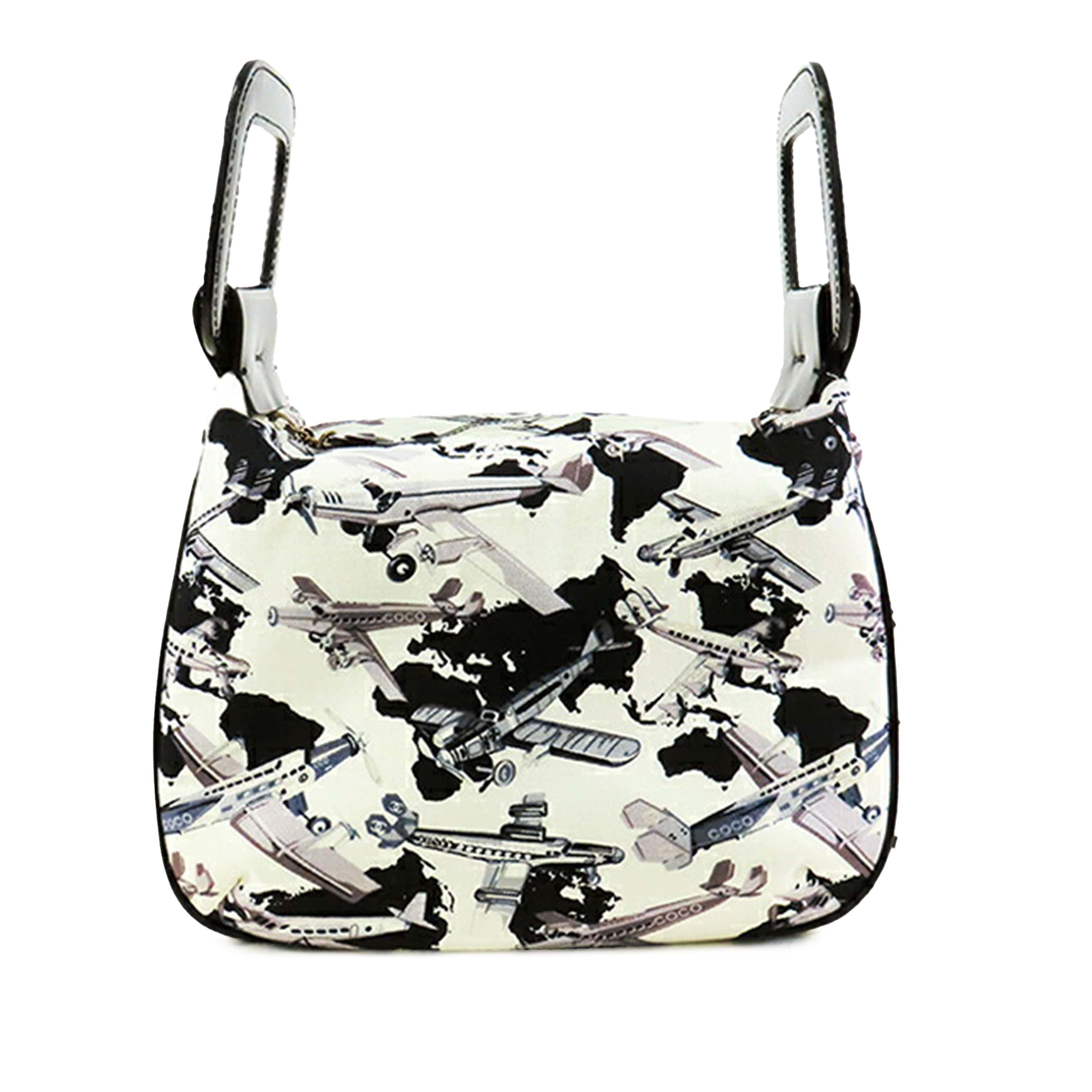 Chanel Printed Canvas Coco Airline Handbag, från Luxclusif, i färgen white. Klicka för att öppna bilden i stort format