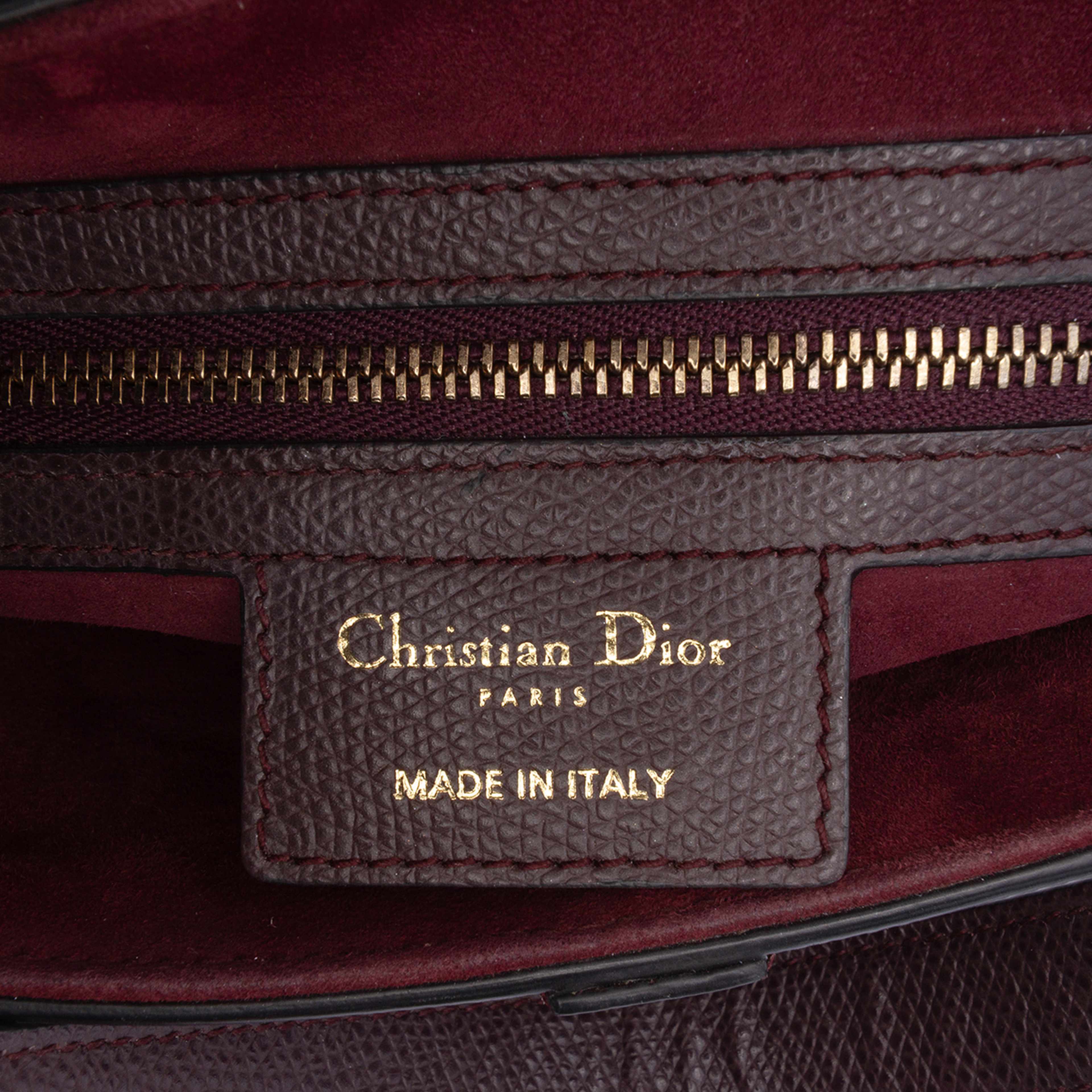 Dior Mini Grained Calfskin Saddle Bag, från Luxclusif, i färgen dark brown. Klicka för att öppna bilden i stort format