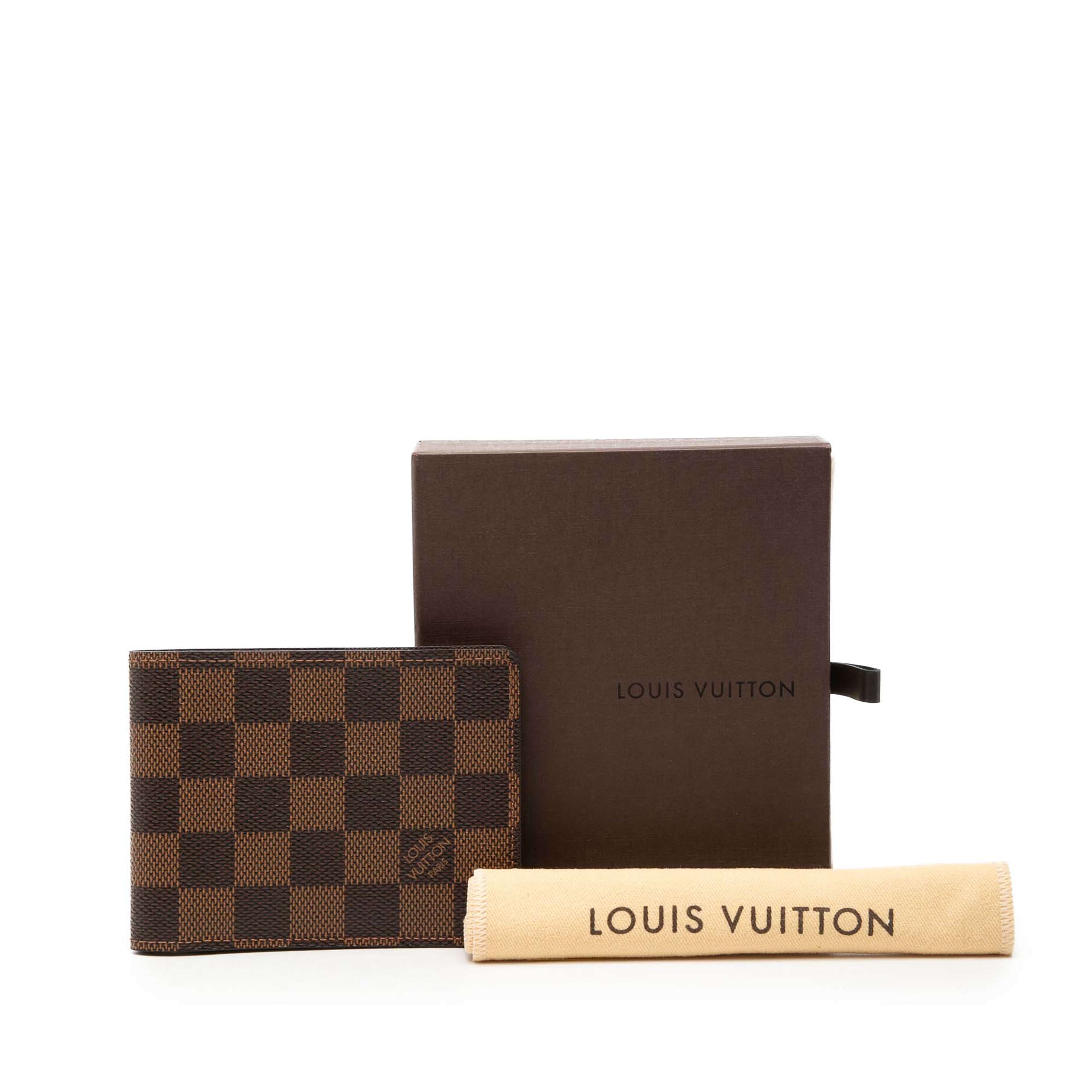 Louis Vuitton Damier Ebene Slender Wallet, från Luxclusif, i färgen brun. Klicka för att öppna bilden i stort format