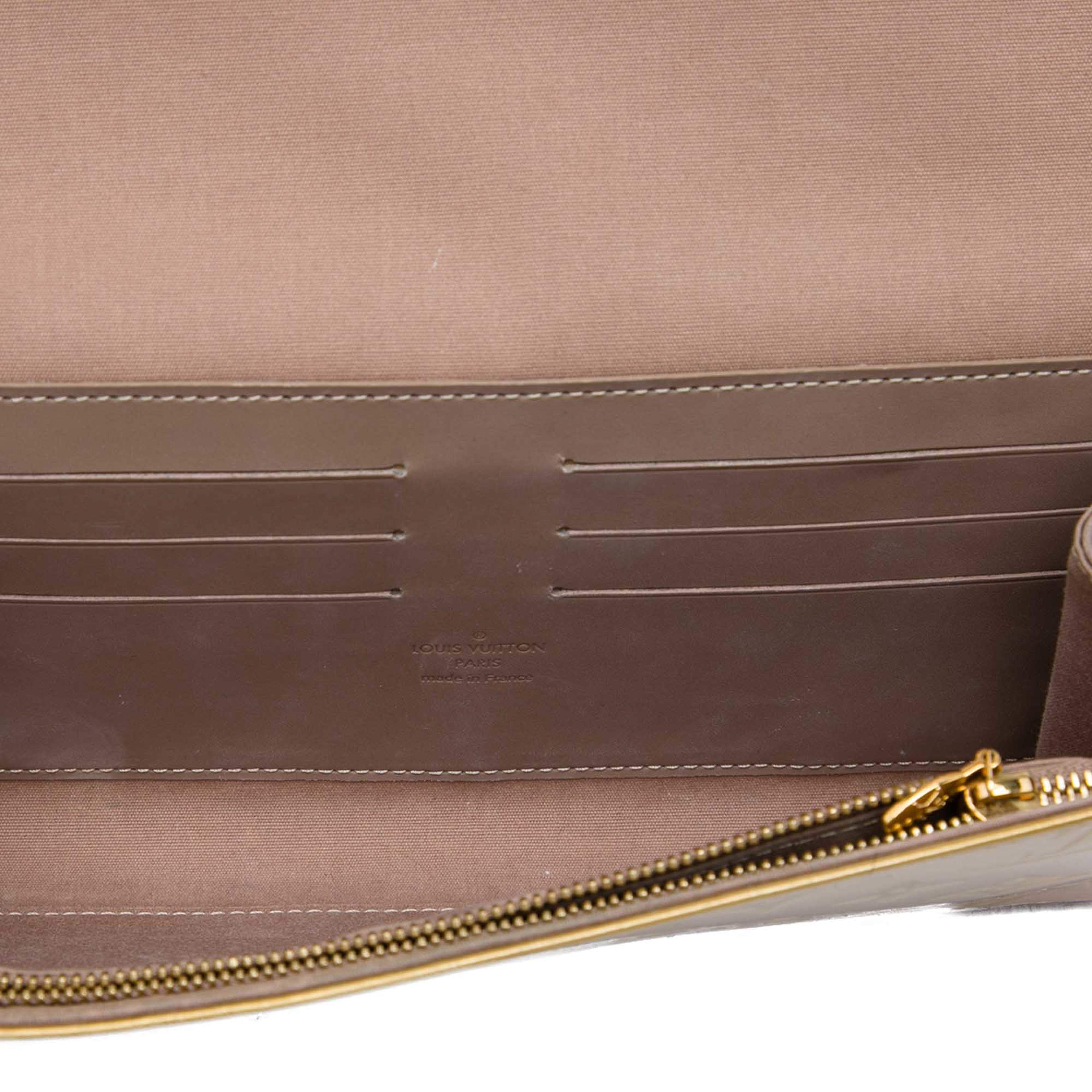 Louis Vuitton Monogram Vernis Rossmore Mm, från Luxclusif, i färgen guld. Klicka för att öppna bilden i stort format