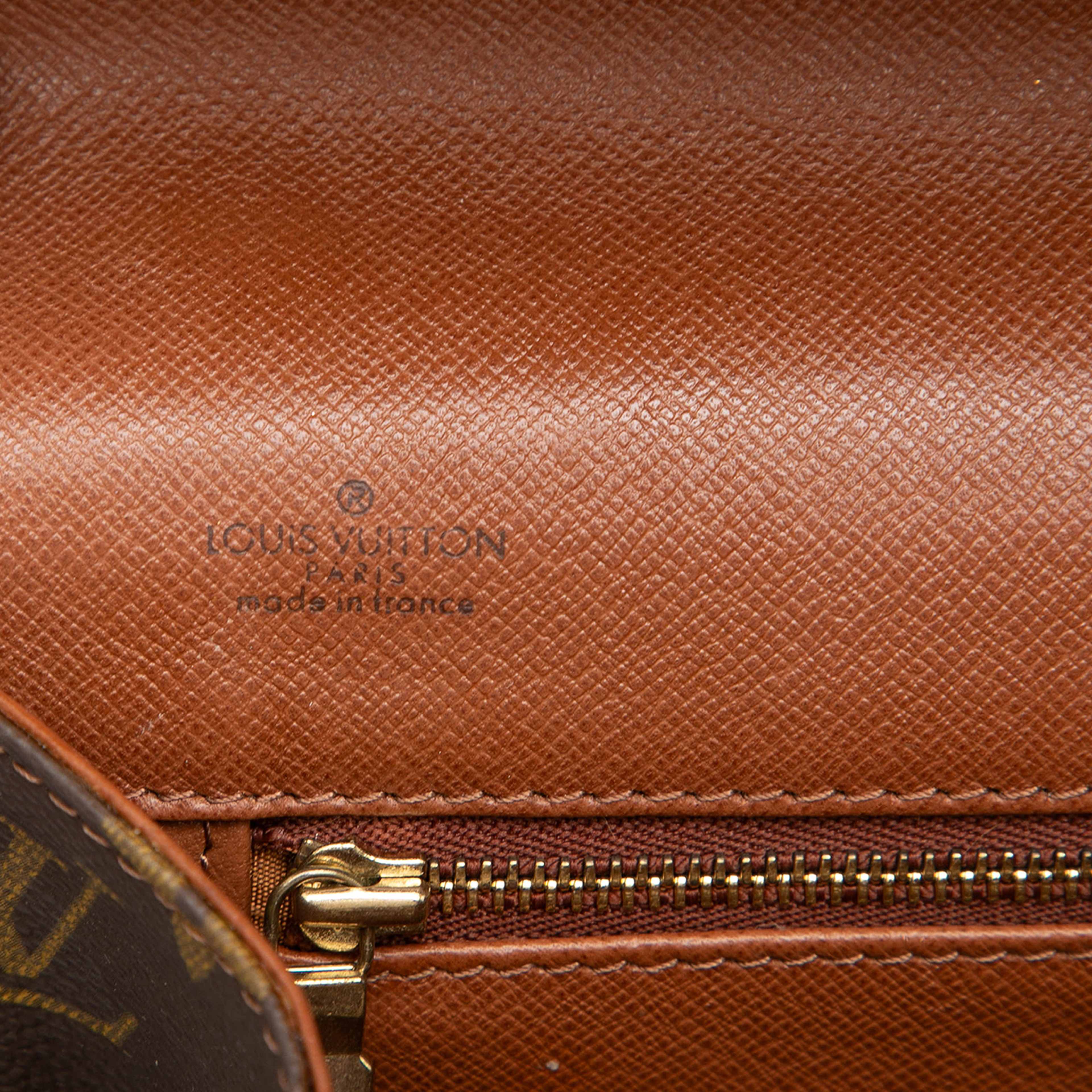 Louis Vuitton Monogram Pochette Dame Gm, från Luxclusif, i färgen brun. Klicka för att öppna bilden i stort format