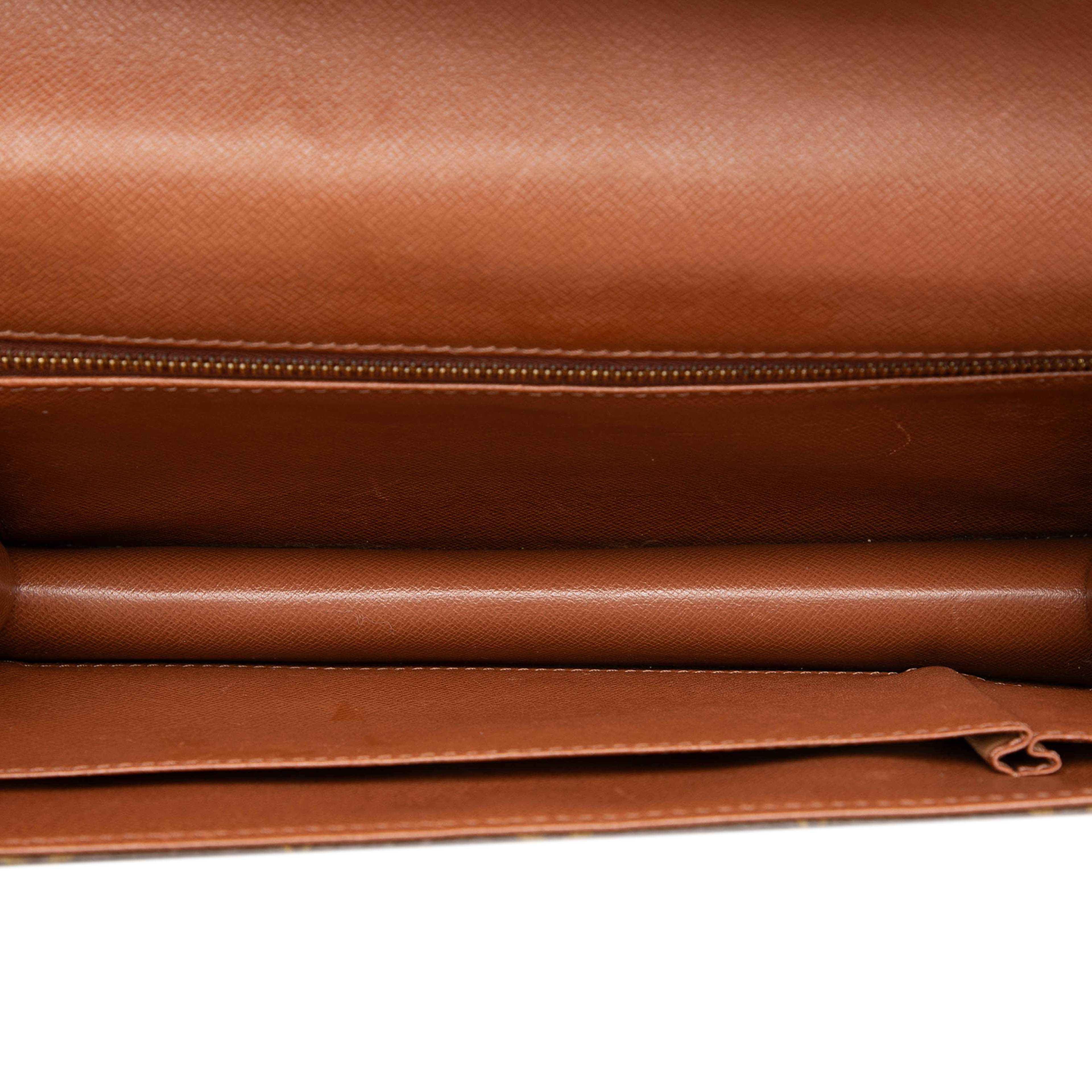 Louis Vuitton Monogram Pochette Dame Gm, från Luxclusif, i färgen brun. Klicka för att öppna bilden i stort format