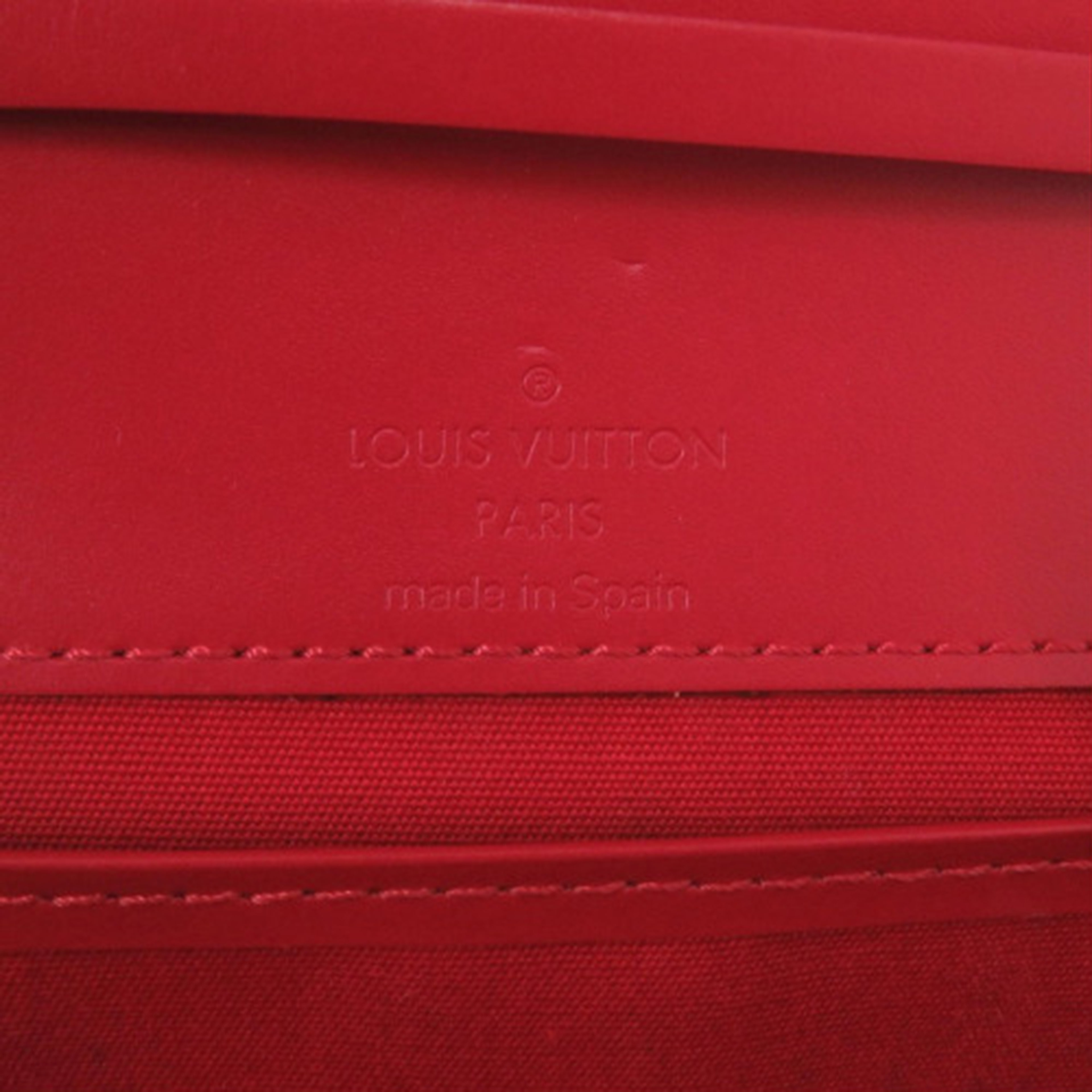 Louis Vuitton Epi Honfleur, från Luxclusif, i färgen red. Klicka för att öppna bilden i stort format