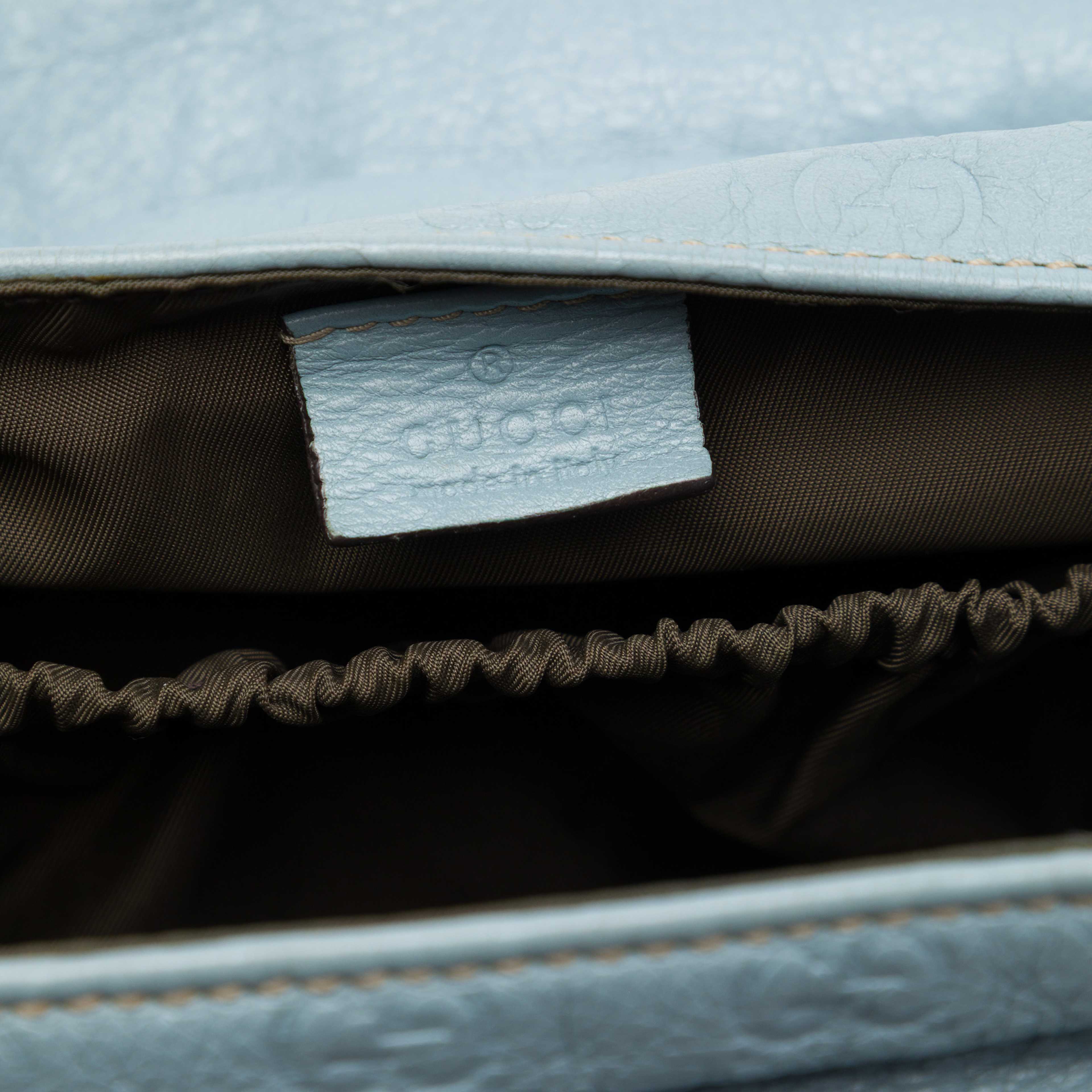 Gucci Guccissima Web Flap Diaper Bag, från Luxclusif, i färgen blå. Klicka för att öppna bilden i stort format