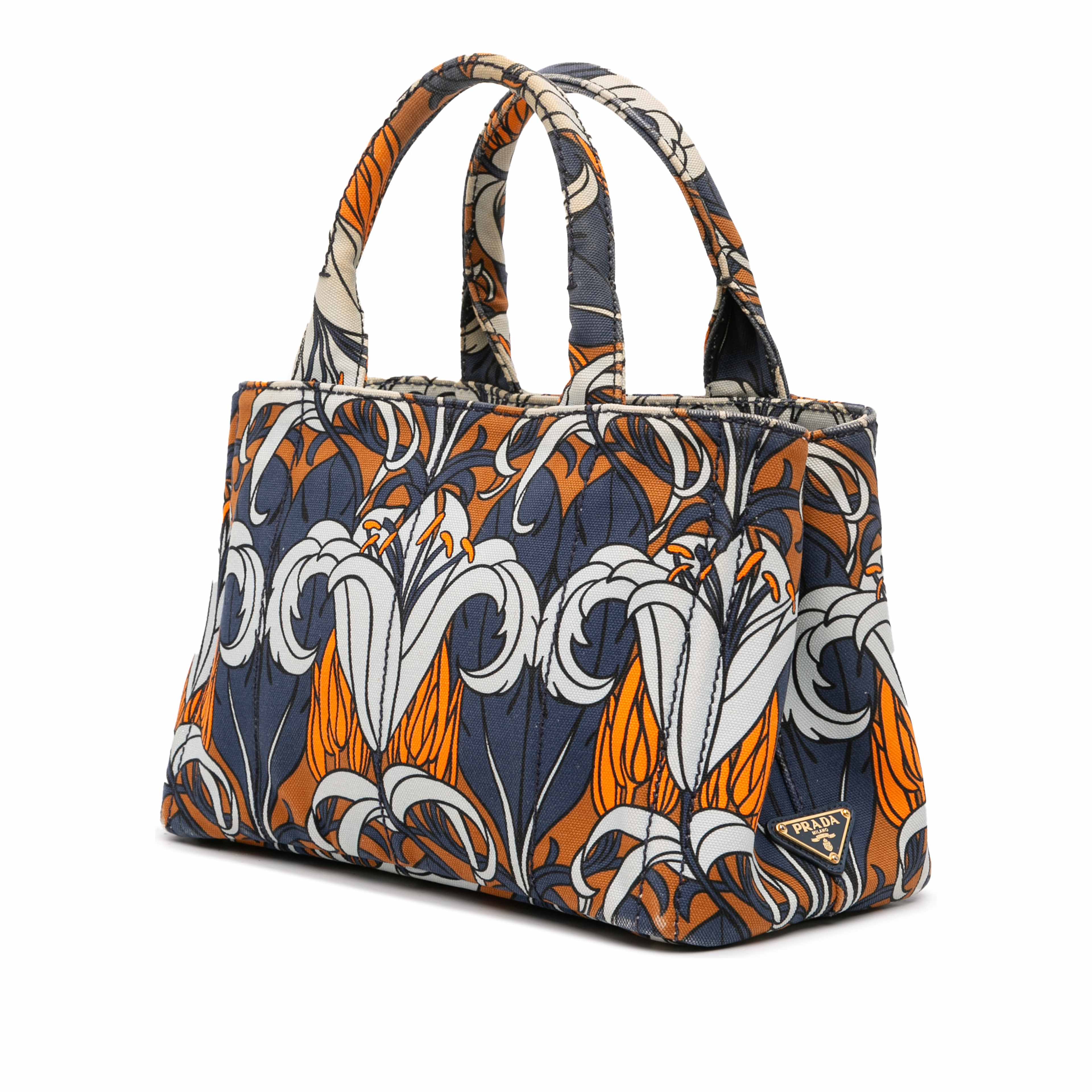 Prada Small Floral Printed Canvas Canapa Satchel, från Luxclusif, i färgen blue. Klicka för att öppna bilden i stort format