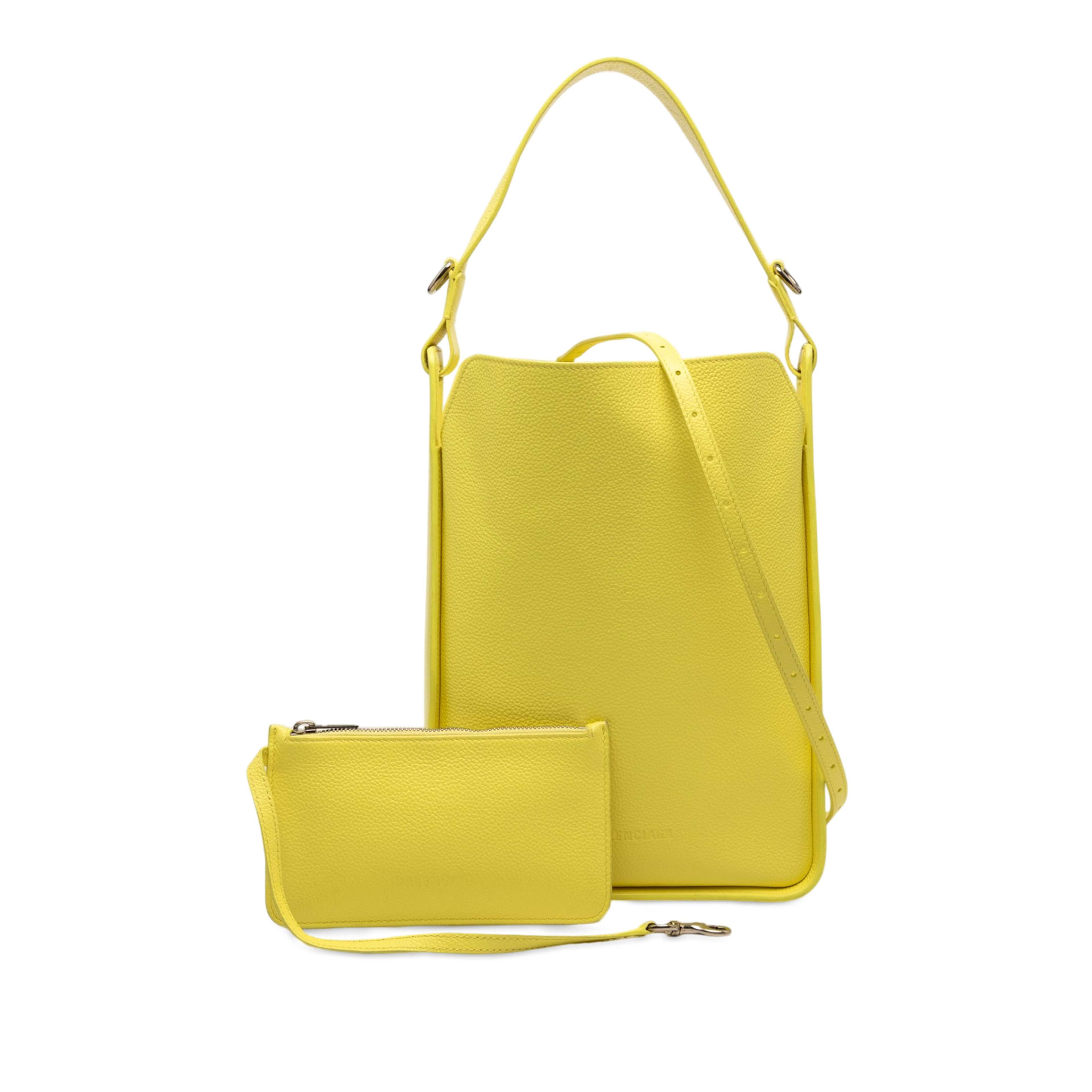 Balenciaga Small Pebbled Calfskin Tool 2.0 North South Tote, från Luxclusif, i färgen gul. Klicka för att öppna bilden i stort format