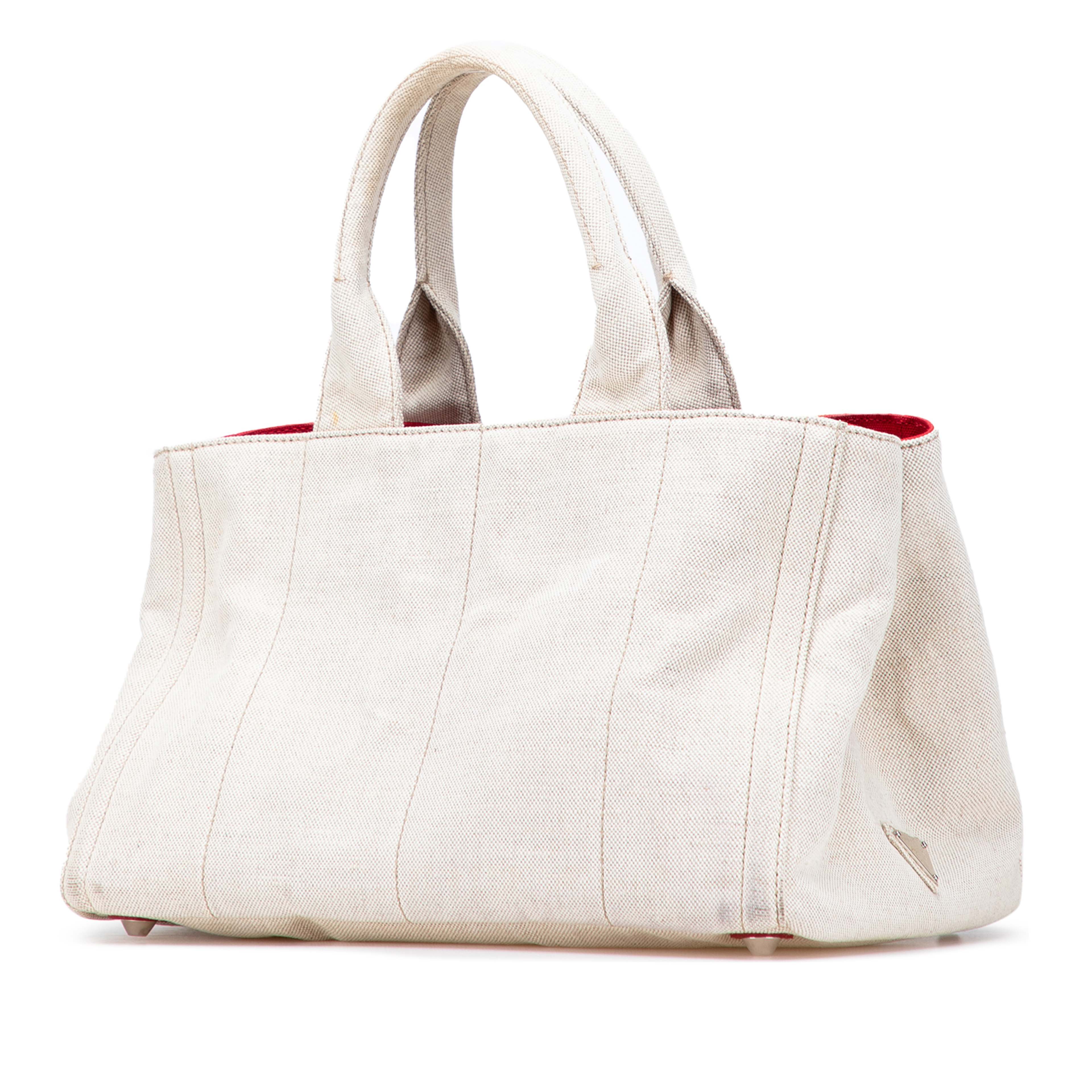 Prada Canvas Canapa Mistolino Tote, från Luxclusif, i färgen light beige. Klicka för att öppna bilden i stort format